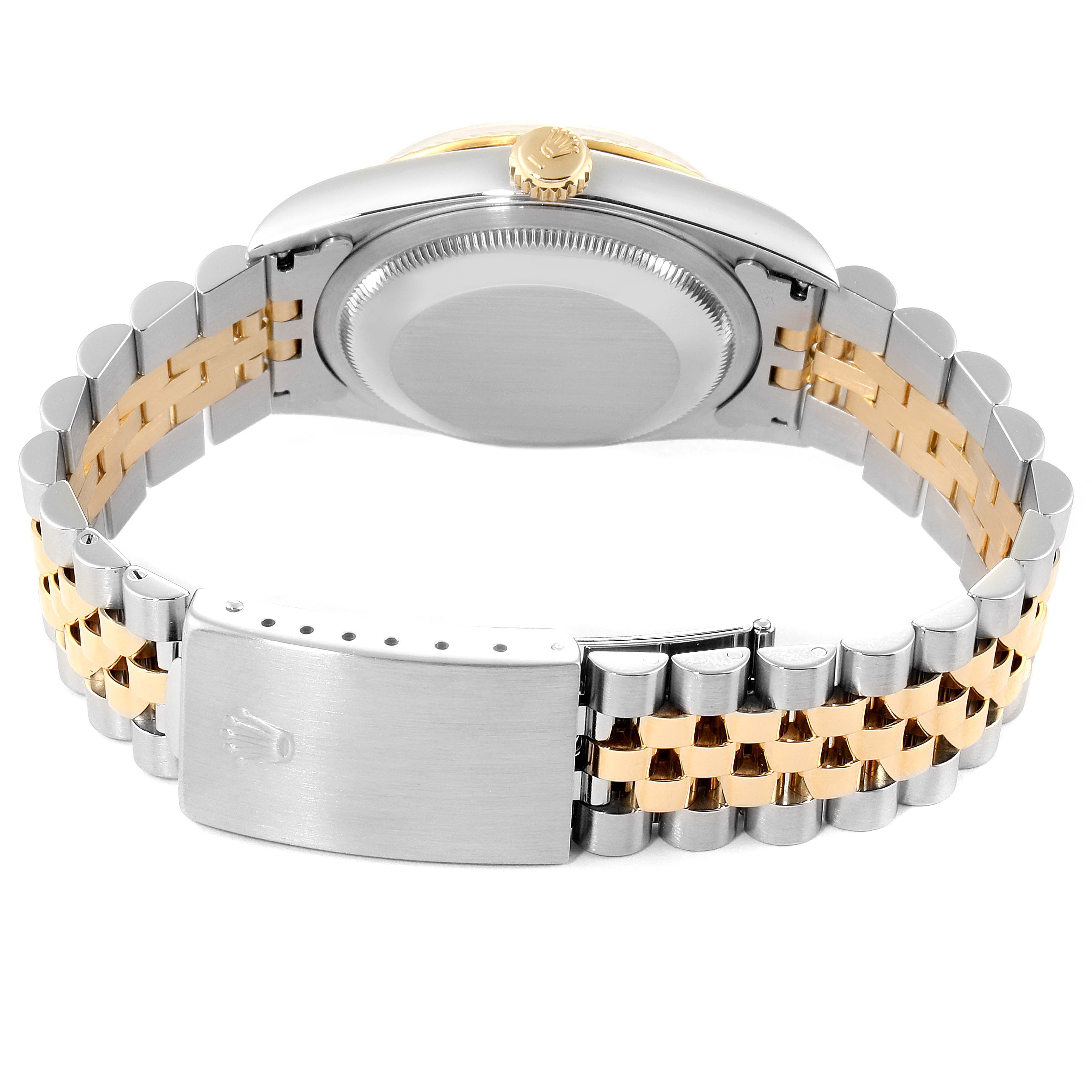 This image shows the back view of a Rolex Datejust 16233 Men's Steel and Gold (two tone) White Dial 16233 Men's Steel and Gold (two tone) White Dial watch, highlighting the clasp and bracelet.
