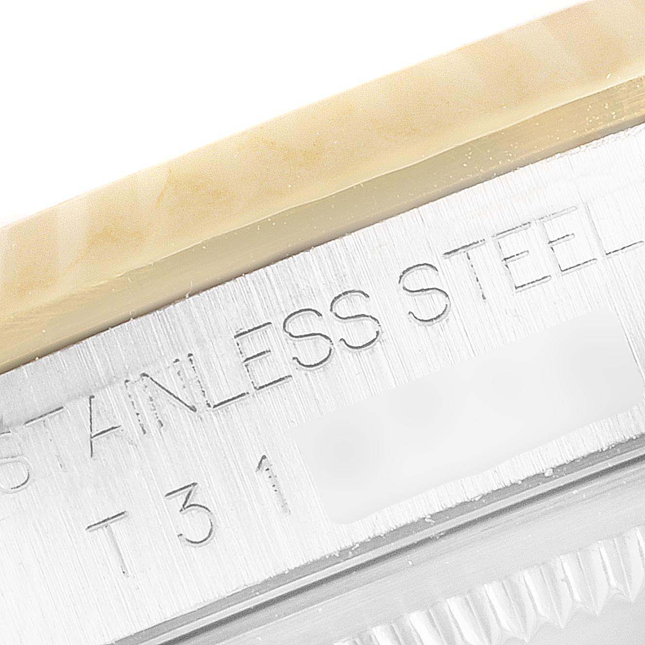 The image shows an angled close-up of the stainless steel case edge and part of the bezel of a Rolex Datejust 16233 Men's Steel and Gold (two tone) White Dial 16233 Men's Steel and Gold (two tone) White Dial watch.