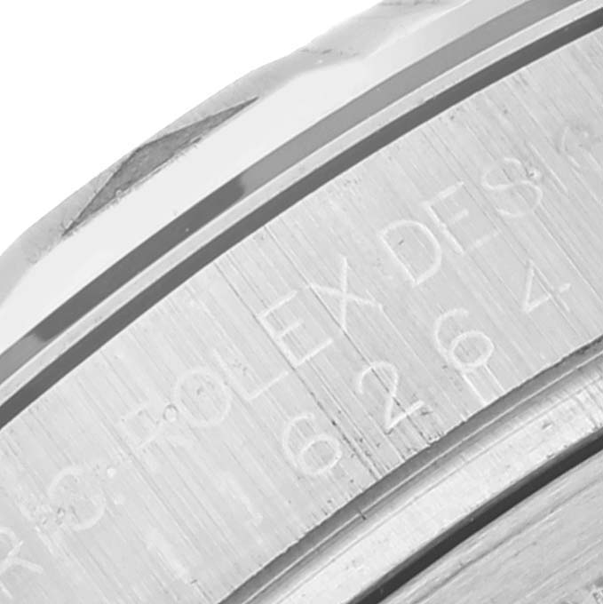 This image shows a close-up of the bezel and engravings on the Rolex Turn-o-Graph 116264 Men's Stainless Steel Black Dial 116264 Men's Stainless Steel Black Dial model watch.