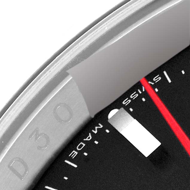 Close-up of the Rolex Turn-o-Graph 116264 Men's Stainless Steel Black Dial 116264 Men's Stainless Steel Black Dial watch face, showing part of the dial, a portion of the bezel, and the second hand.