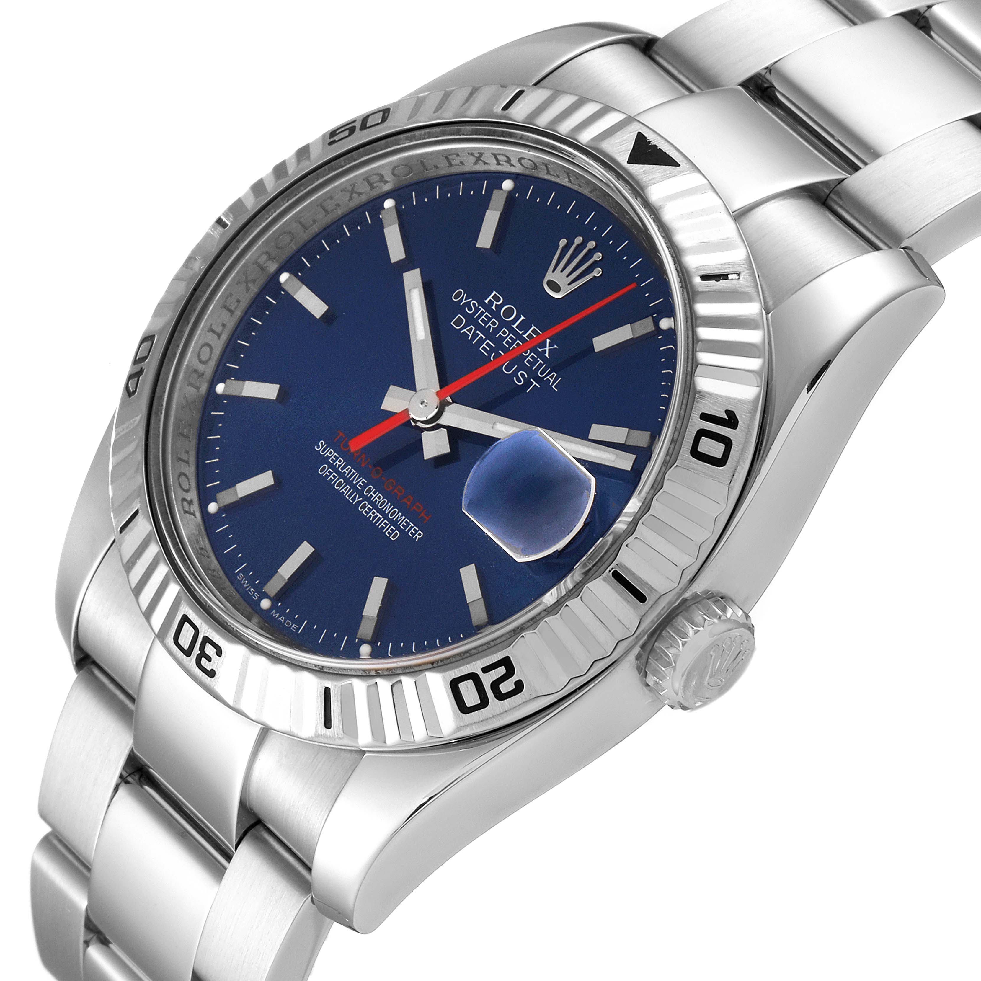 The watch is shown at an angled view, displaying the face, fluted bezel, crown, and part of the bracelet; it
s a Rolex Turn-o-Graph 116264 Men
s Stainless Steel Blue Dial 116264 Men
s Stainless Steel Blue Dial model.