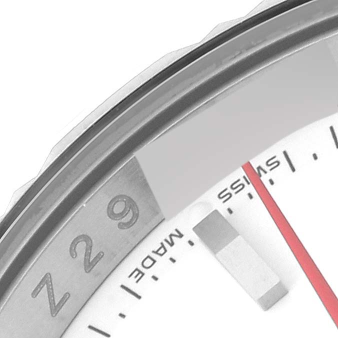 This image shows a close-up shot of the bezel, part of the dial, and the red seconds hand of a Rolex Turn-o-Graph 116264 Men
s Stainless Steel White Dial 116264 Men
s Stainless Steel White Dial watch.
