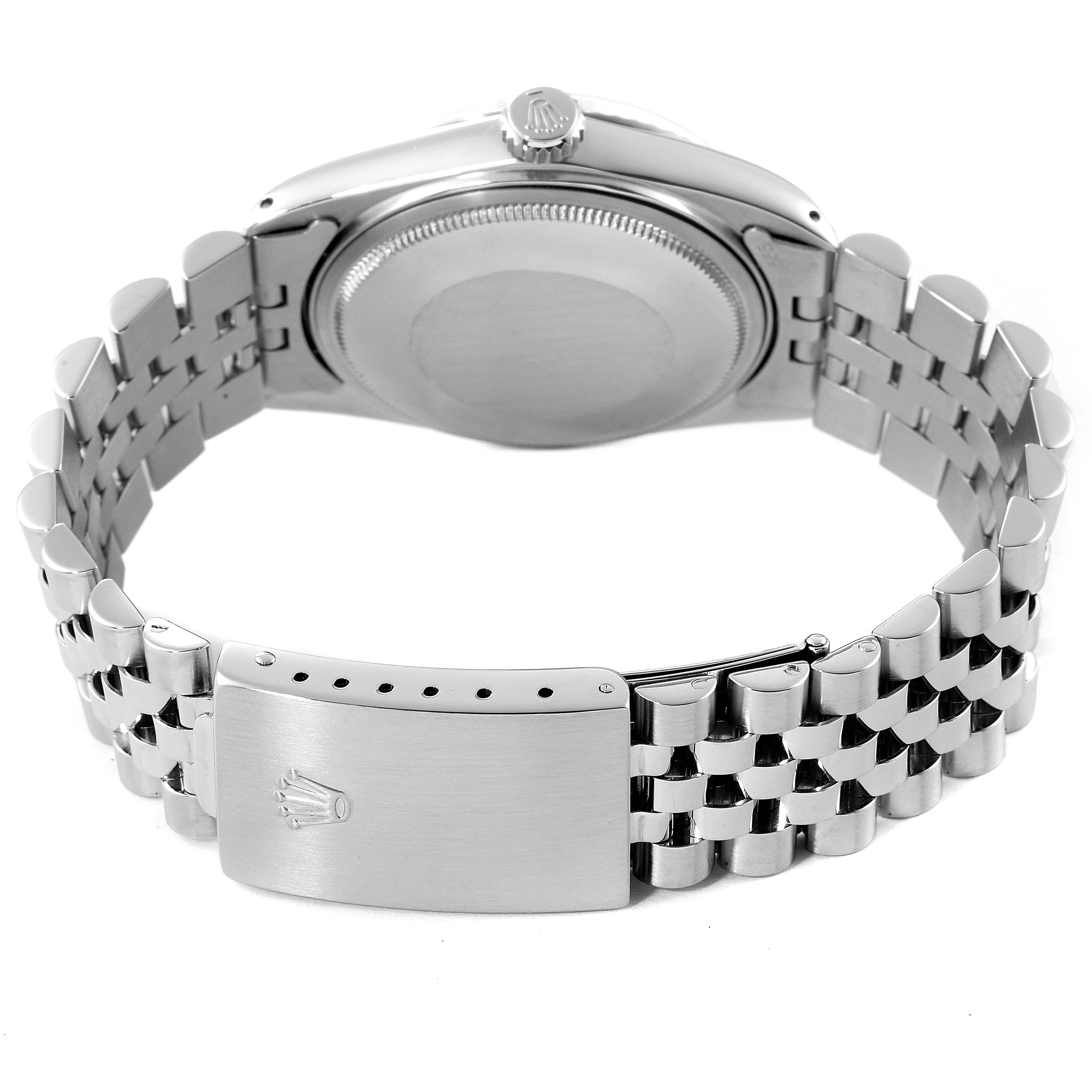 The image shows the back view of the Vintage Collection Rolex watch, highlighting its case back and bracelet with the clasp.