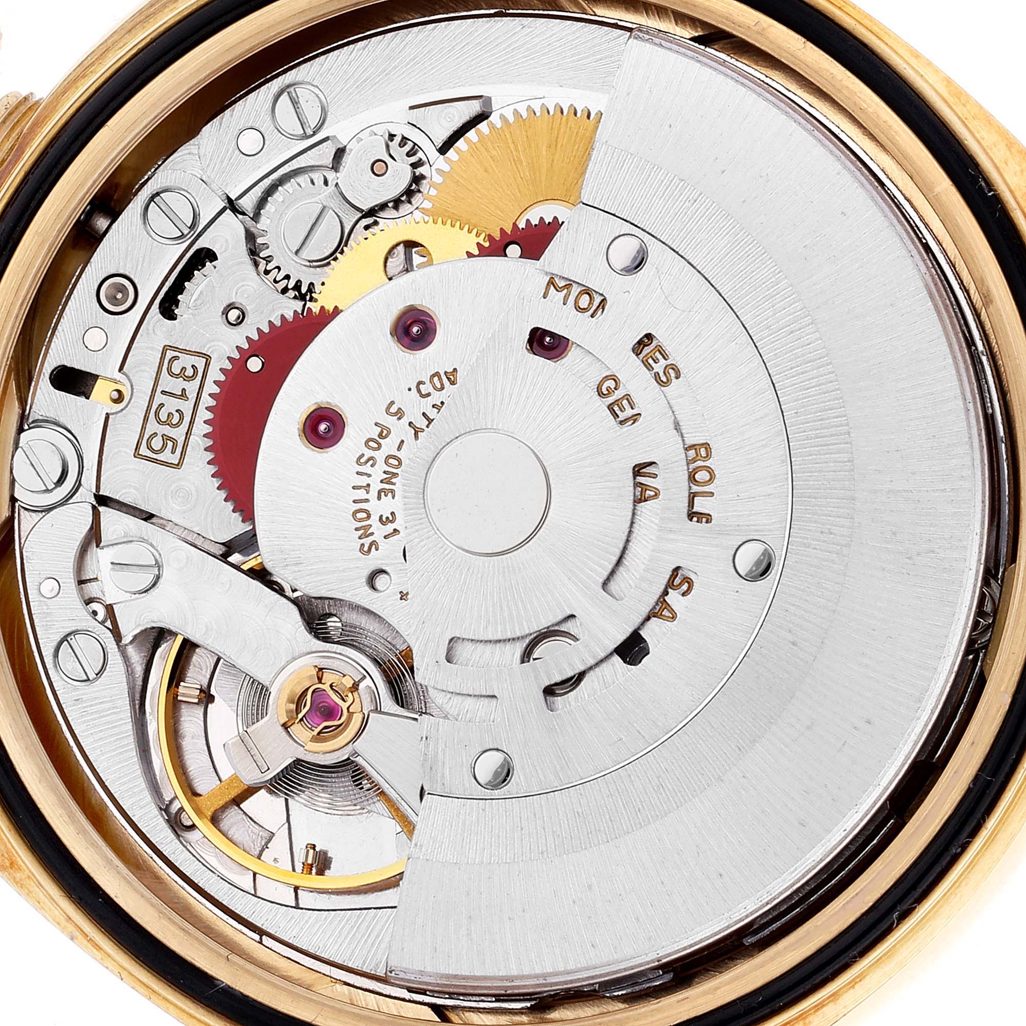 This image shows the intricate inner mechanism of the Rolex Datejust 16238 Men's Yellow Gold Champagne Dial 16238 Men's Yellow Gold Champagne Dial watch, focusing on the movement parts.