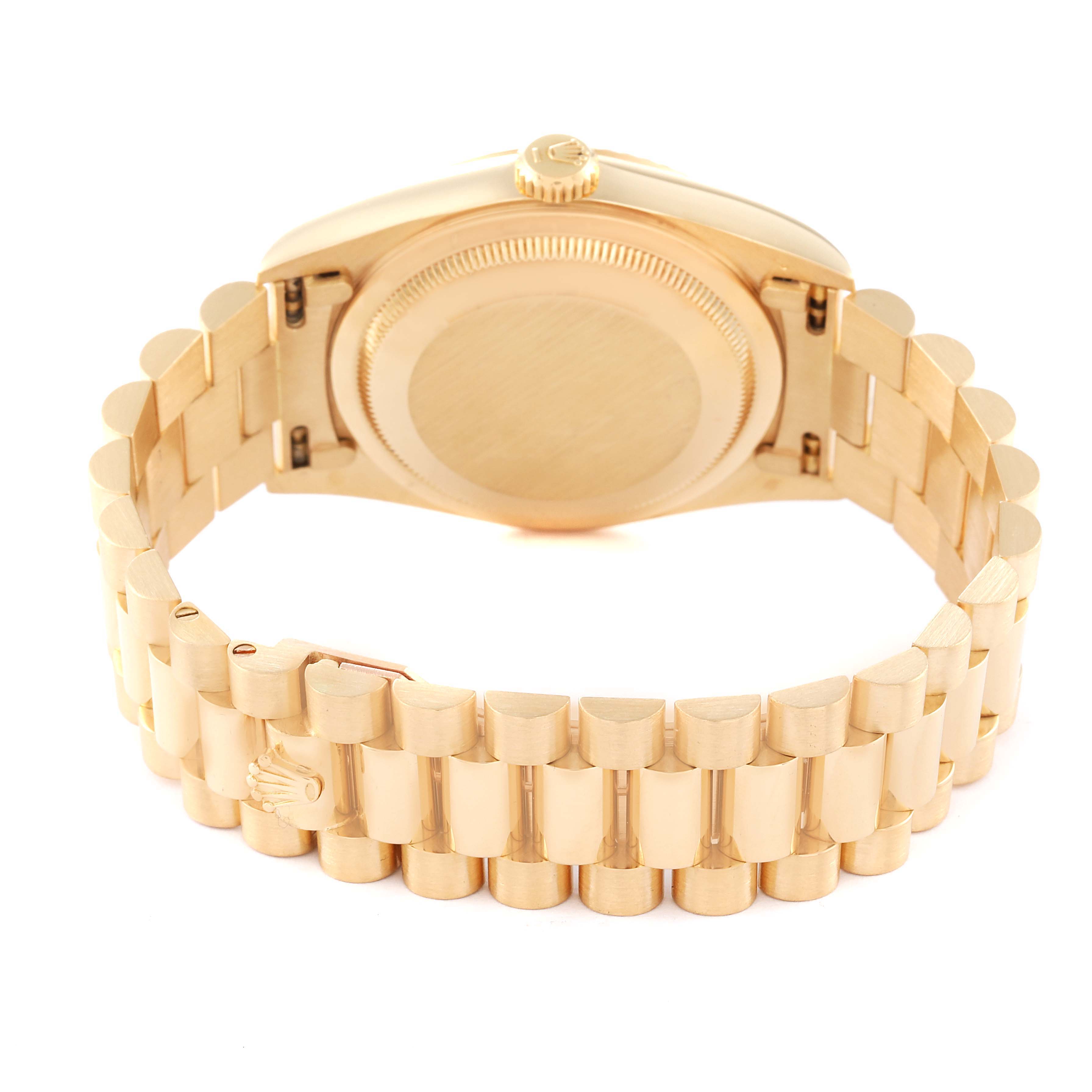 This image shows the back view of a Rolex President 18238 Men
s Yellow Gold Champagne Dial 18238 Men
s Yellow Gold Champagne Dial model watch, highlighting the case back and bracelet clasp.
