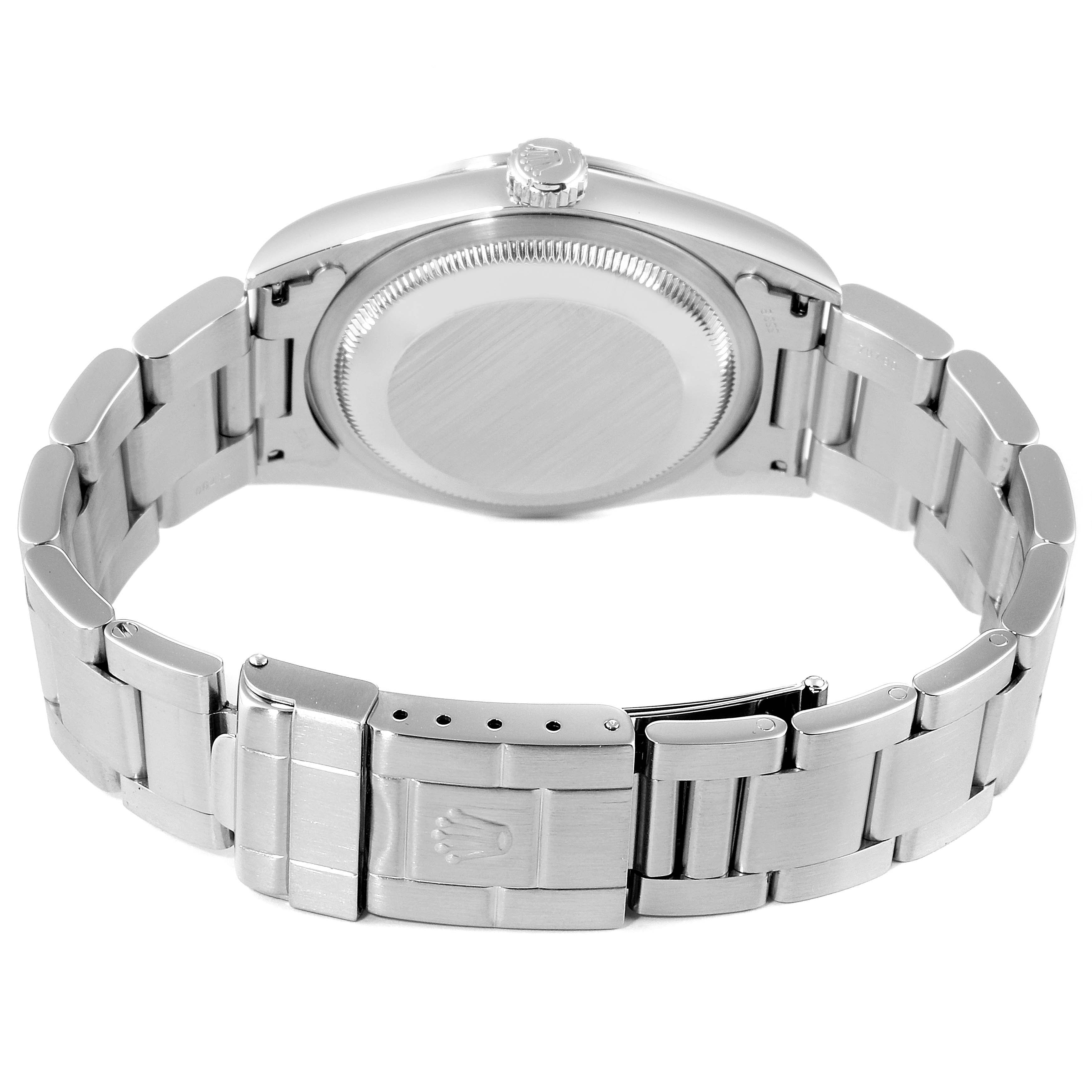 The image shows the back view of a Rolex Explorer 14270 Men's Stainless Steel Black Dial 14270 Men's Stainless Steel Black Dial watch, highlighting its case back, crown, and bracelet with clasp.