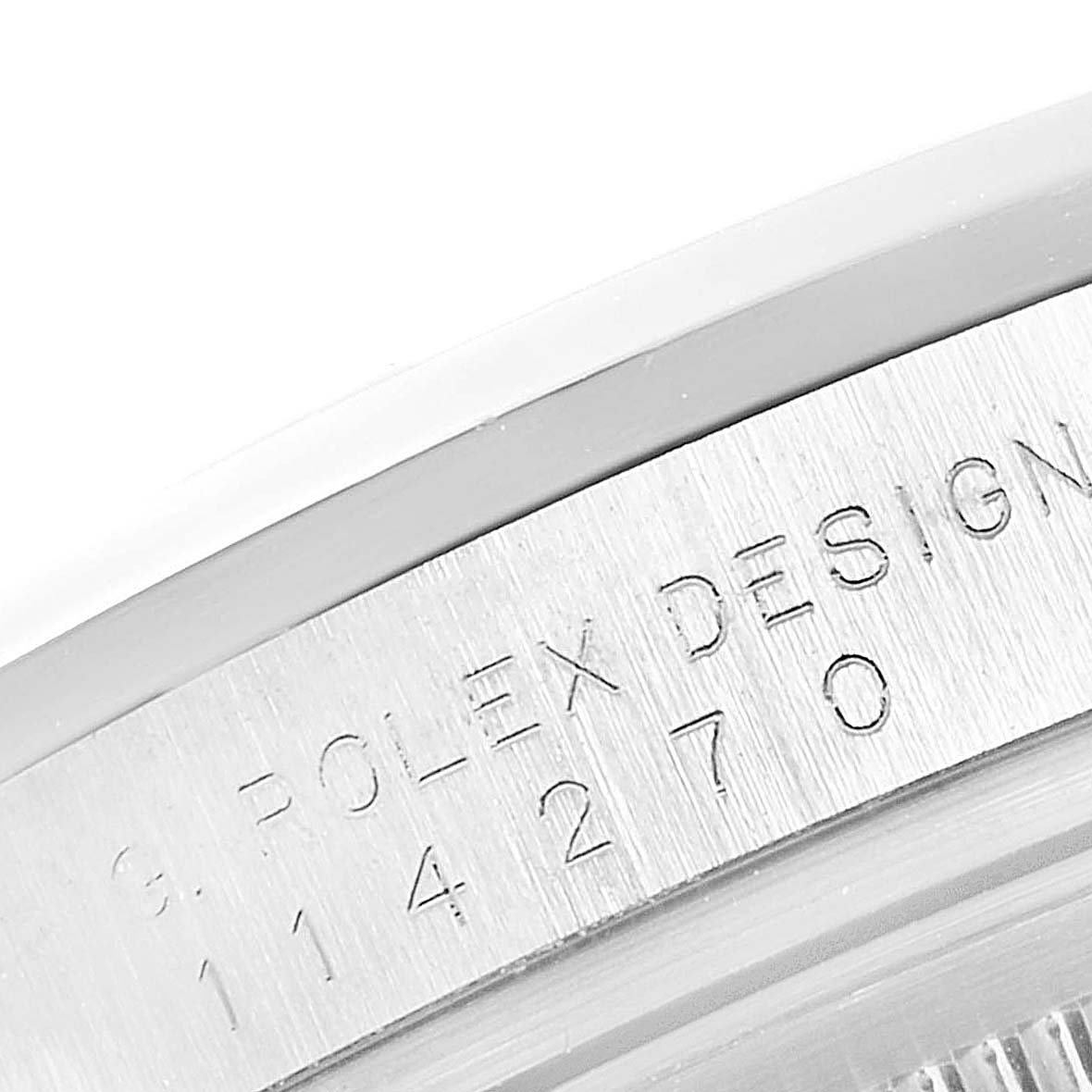 The image shows a close-up of the side engraving on the casing of a Rolex Explorer 114270 Men
s Stainless Steel Black Dial 114270 Men
s Stainless Steel Black Dial watch.