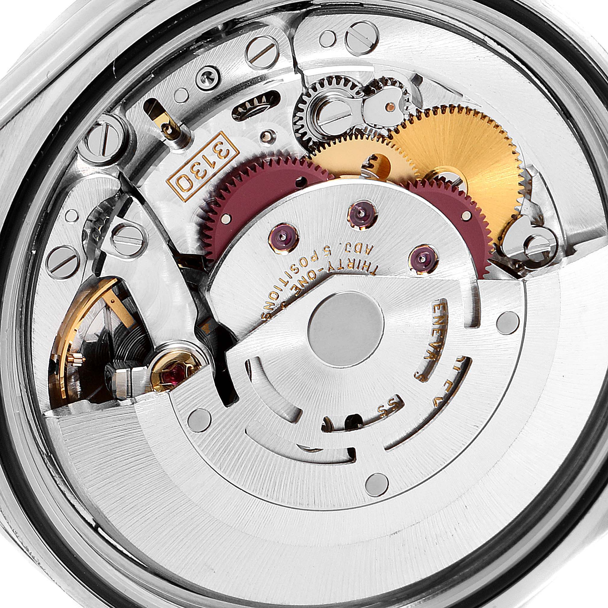 The image shows a close-up of the movement and internal mechanism of a Rolex Explorer 114270 Men
s Stainless Steel Black Dial 114270 Men
s Stainless Steel Black Dial model watch.