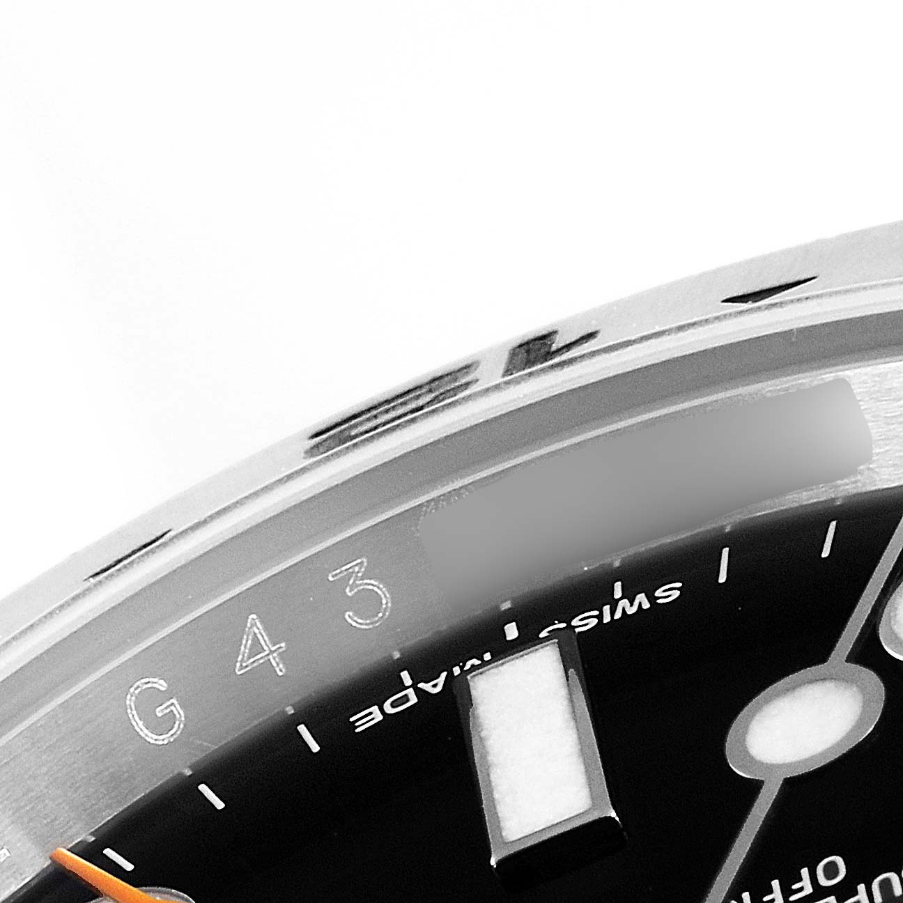 The image shows a close-up view of the dial, bezel, and part of the case of a Rolex Explorer 216570 Men's Stainless Steel Black Dial 216570 Men's Stainless Steel Black Dial model watch.
