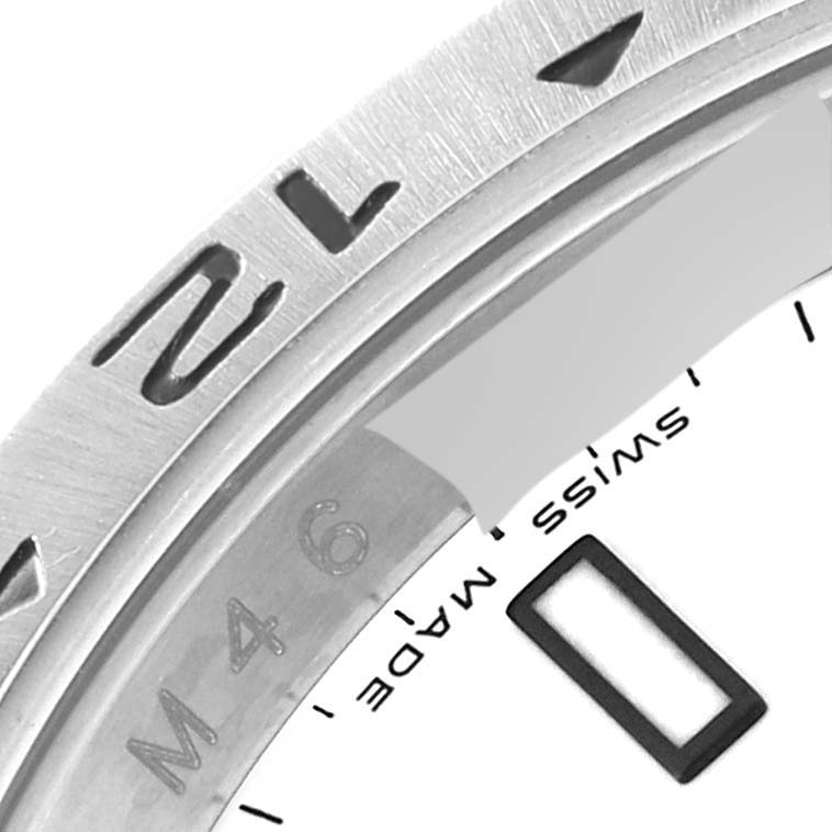 The image shows a close-up of the bezel, rehaut, and part of the dial of a Rolex Explorer 16570 Men's Stainless Steel White Dial 16570 Men's Stainless Steel White Dial watch.