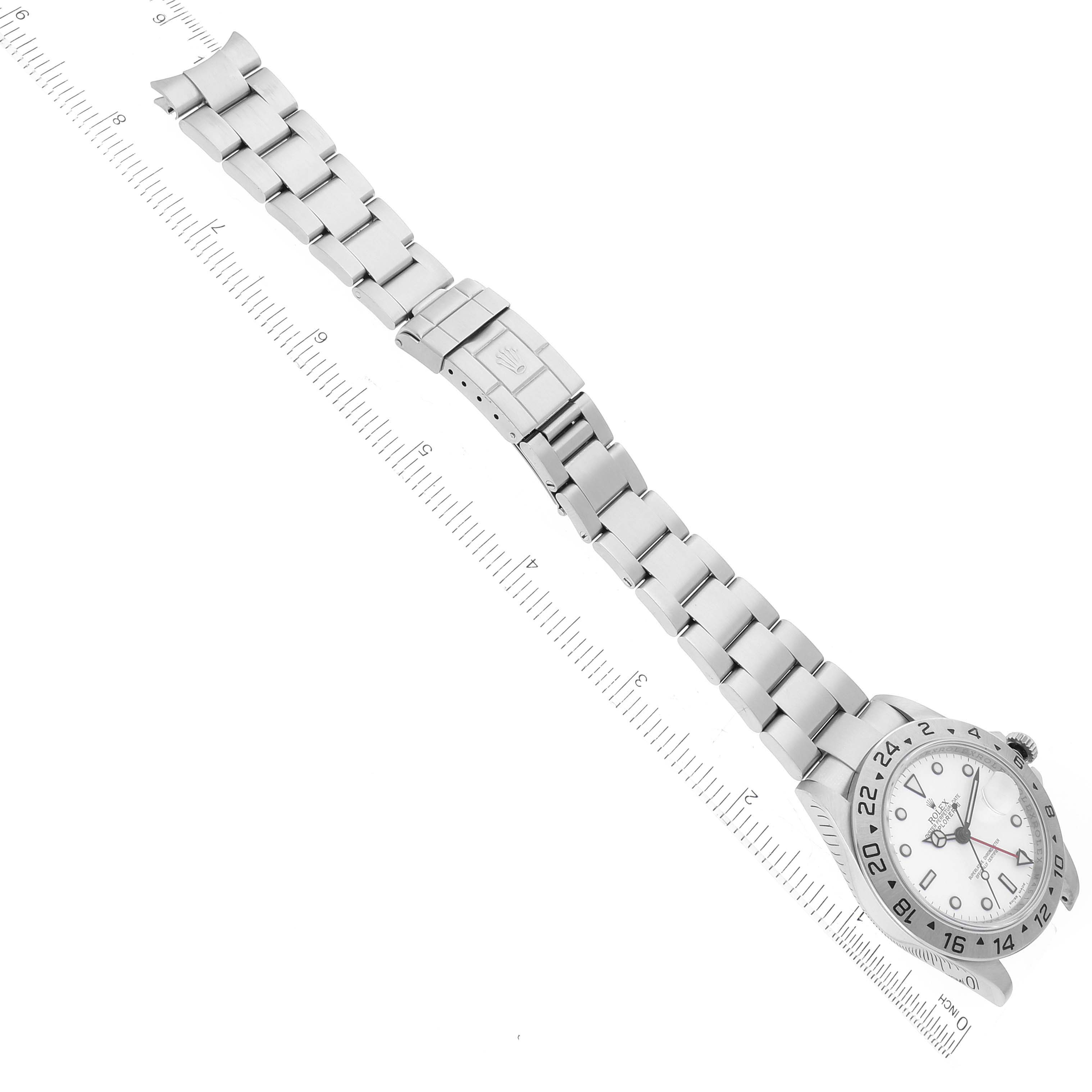 The image shows a Rolex Explorer 16570 Men's Stainless Steel White Dial 16570 Men's Stainless Steel White Dial watch in a top-down angle, highlighting its bracelet, clasp, and white dial.