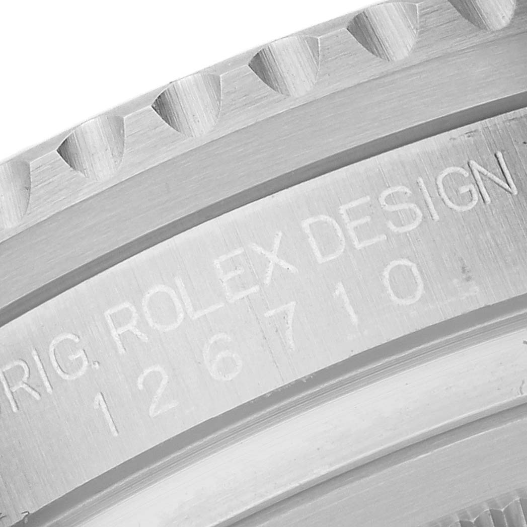The image shows a close-up of the engraving and bezel detail for the Rolex GMT-Master 126710BLRO Men
s Stainless Steel Black Dial 126710BLRO Men
s Stainless Steel Black Dial watch model.