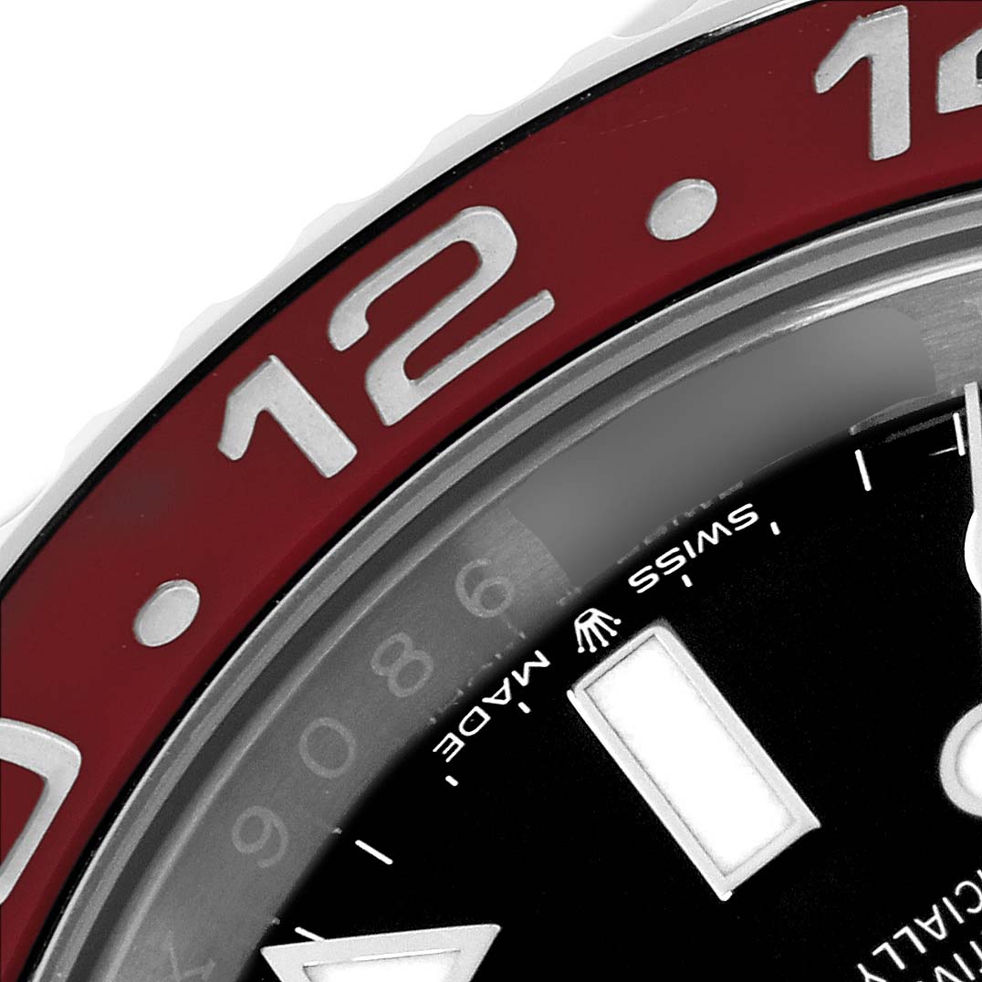 The image shows a close-up of the bezel and part of the dial of a Rolex GMT-Master 126710BLRO Men
s Stainless Steel Black Dial 126710BLRO Men
s Stainless Steel Black Dial watch.