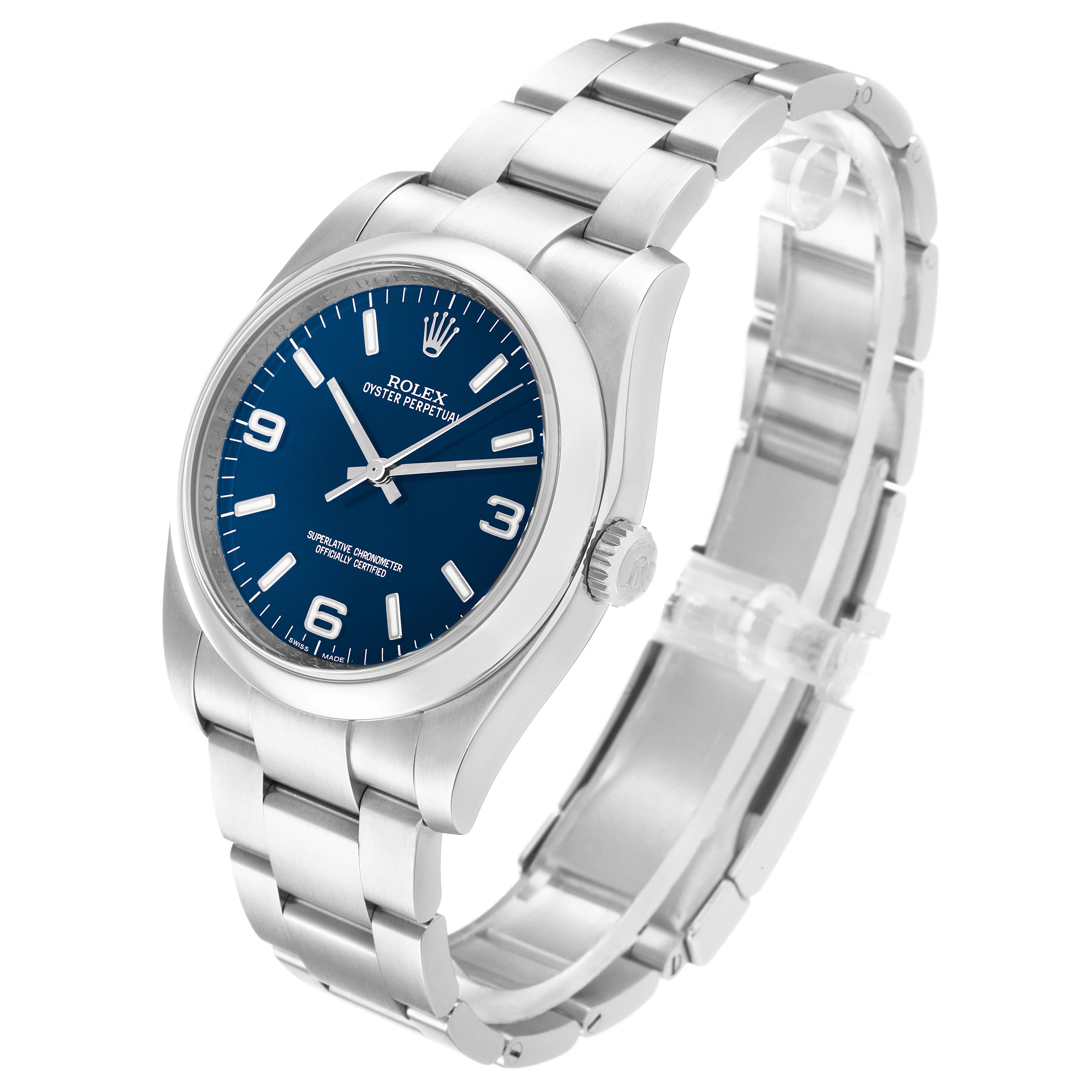 The image shows the Rolex Oyster Perpetual 116000 Men's Stainless Steel Blue Dial 116000 Men's Stainless Steel Blue Dial watch at an angle displaying the face, crown, and bracelet.