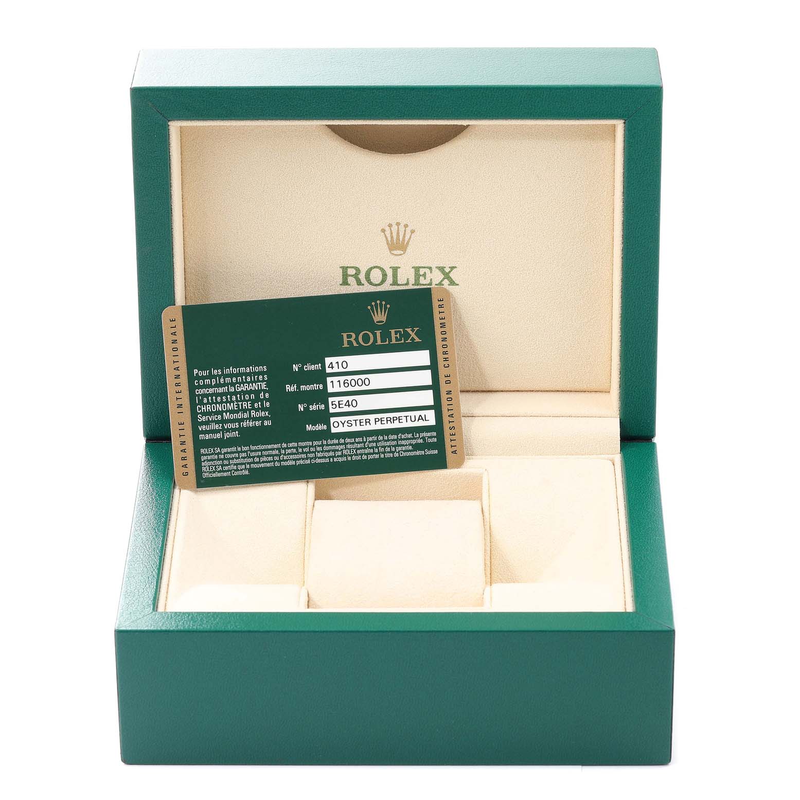 The image shows an open green Rolex box for the Oyster Perpetual model, displaying its warranty card.