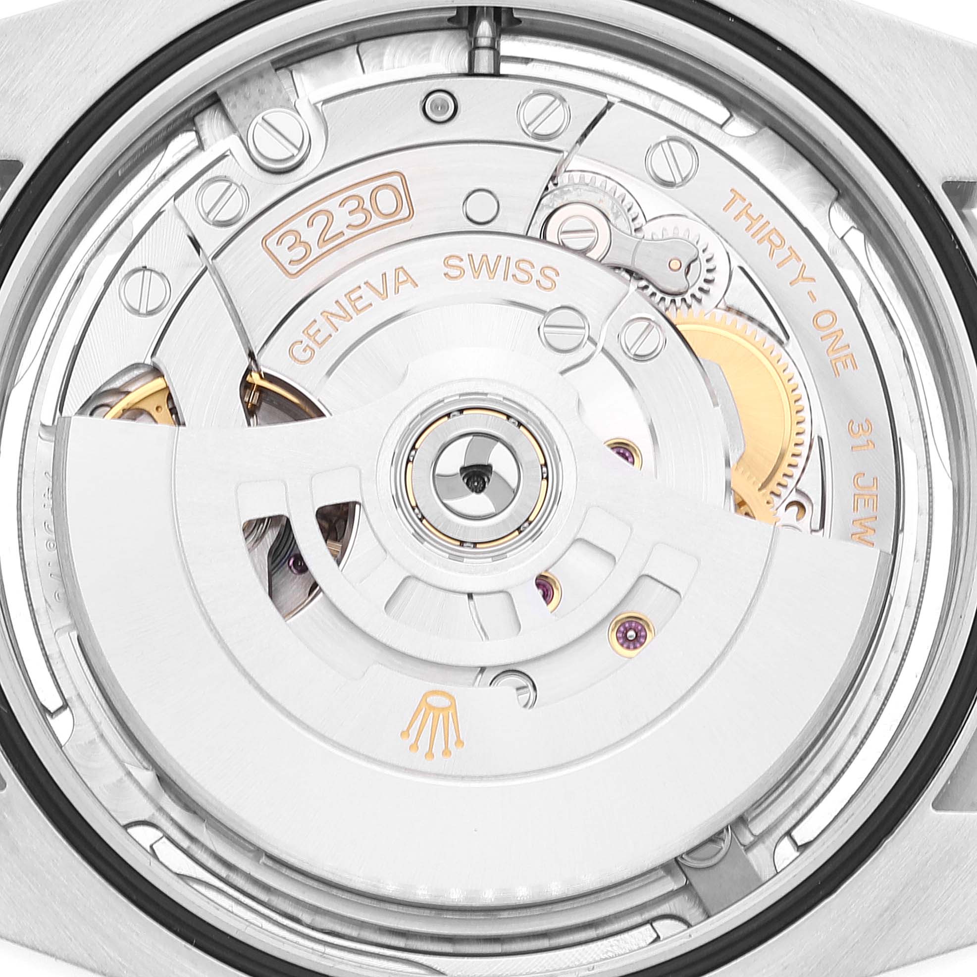 The image shows the back view of the Rolex Oyster Perpetual 124300 Men's Stainless Steel Silver Dial 124300 Men's Stainless Steel Silver Dial watch, revealing its internal movement mechanism.