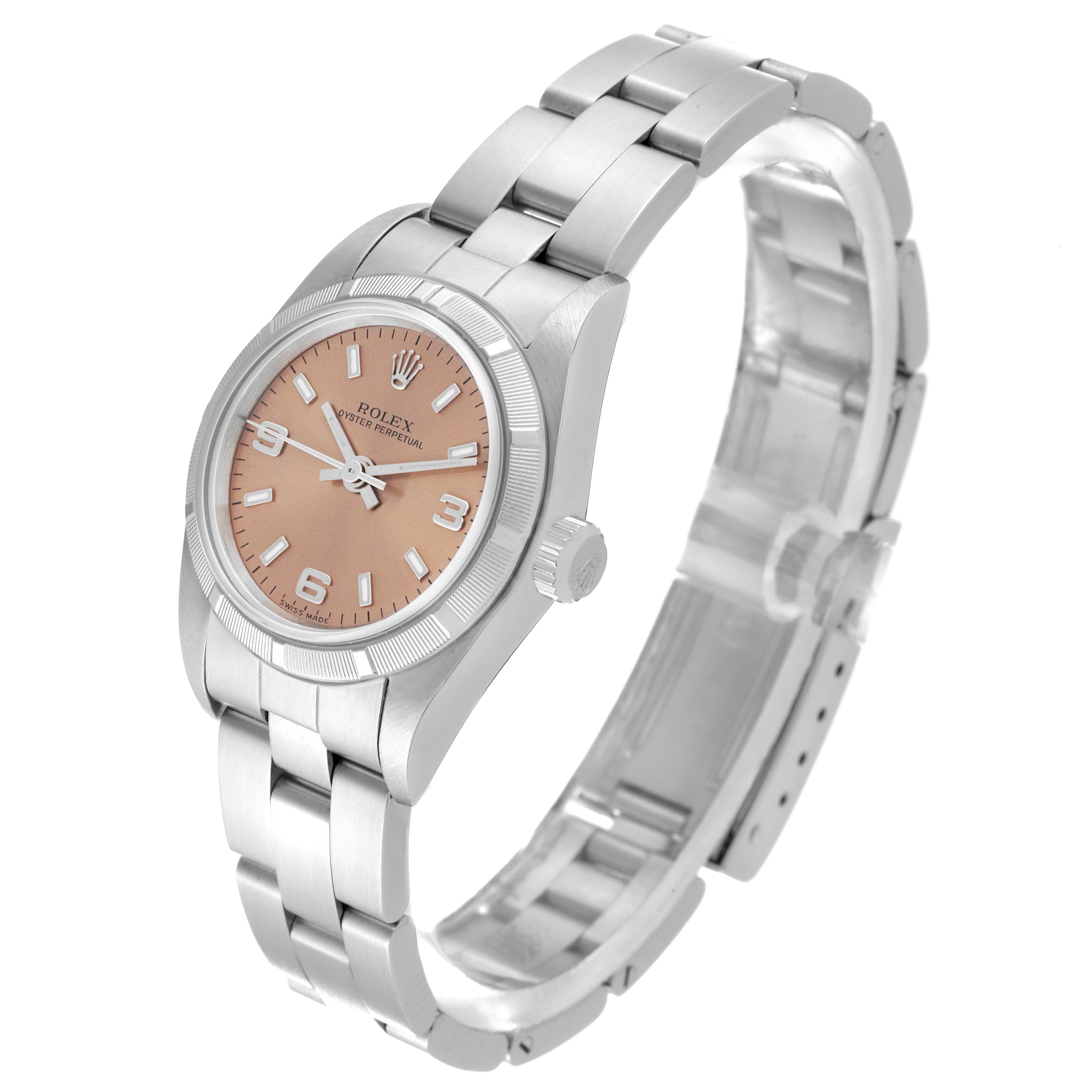 This image shows a side-angle view of a Rolex Oyster Perpetual 76030 Women's Stainless Steel Pink Dial 76030 Women's Stainless Steel Pink Dial watch, including its face, bezel, crown, and bracelet.