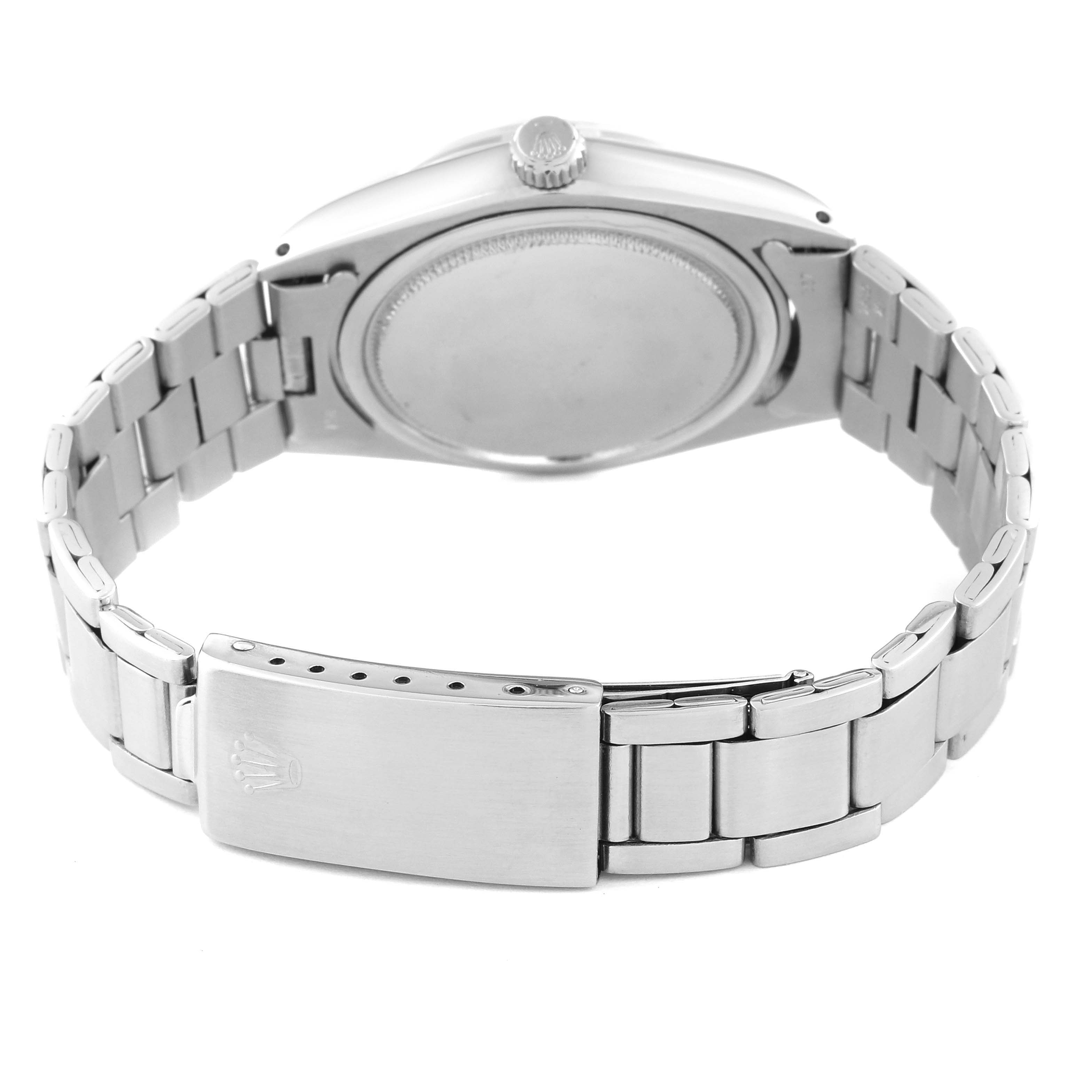 This image shows the back view of the Rolex Vintage Collection 6694 Men's Stainless Steel Champagne Dial 6694 Men's Stainless Steel Champagne Dial watch, showcasing its bracelet and clasp.