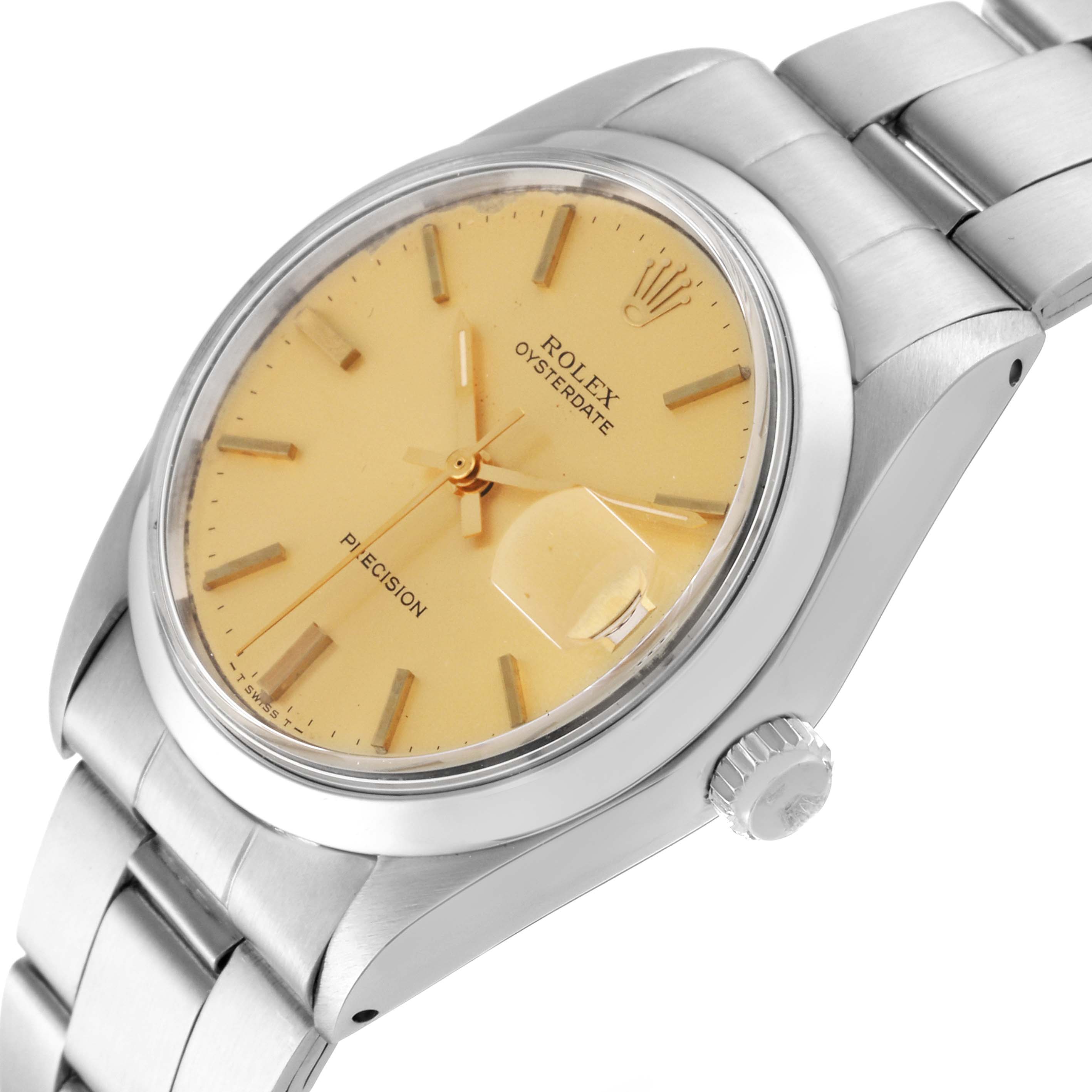The image shows a side-angle view of the Rolex Vintage Collection 6694 Men's Stainless Steel Champagne Dial 6694 Men's Stainless Steel Champagne Dial Oysterdate watch, highlighting its dial, bezel, crown, and bracelet.
