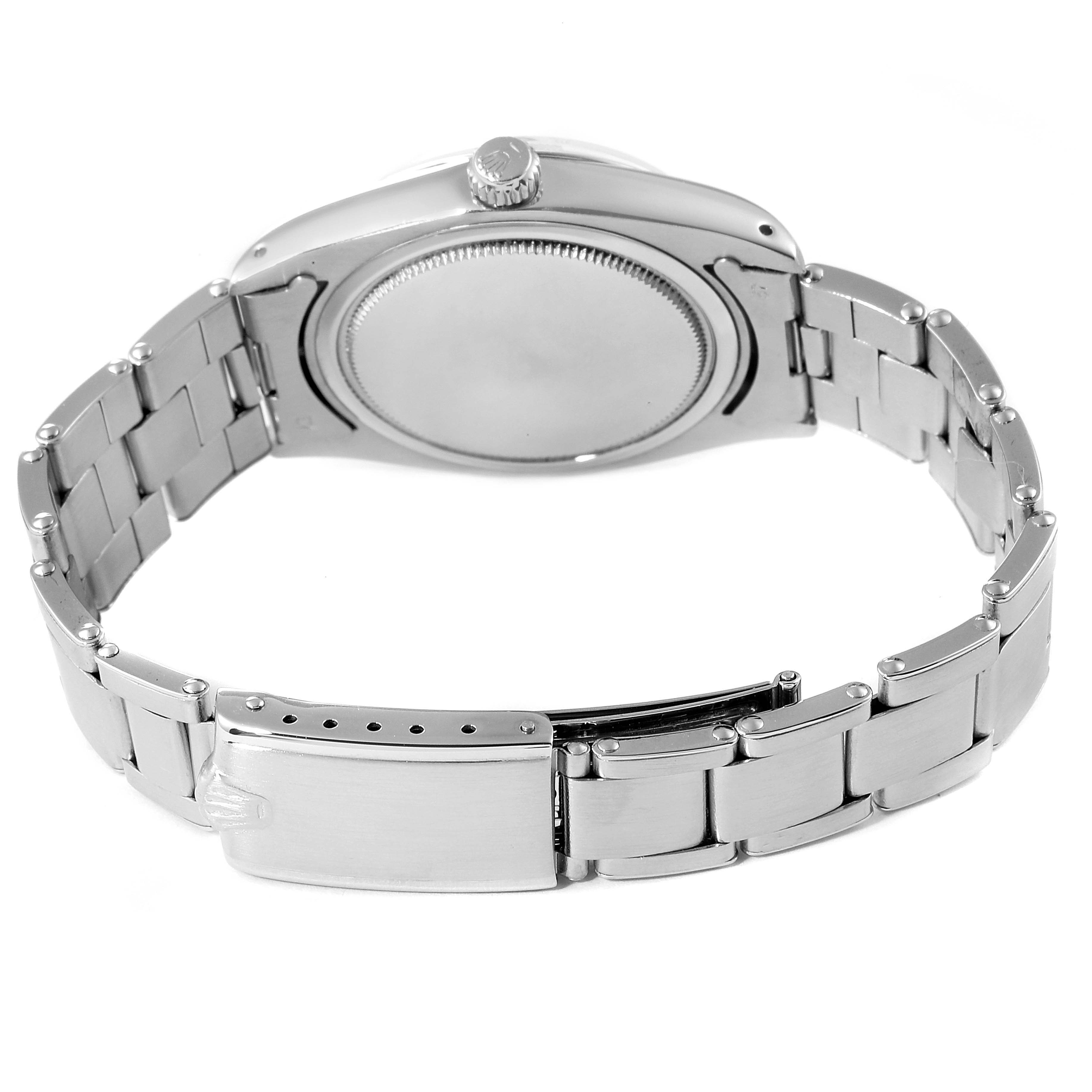 This image shows the back casing and bracelet of the Vintage Collection model by Rolex.