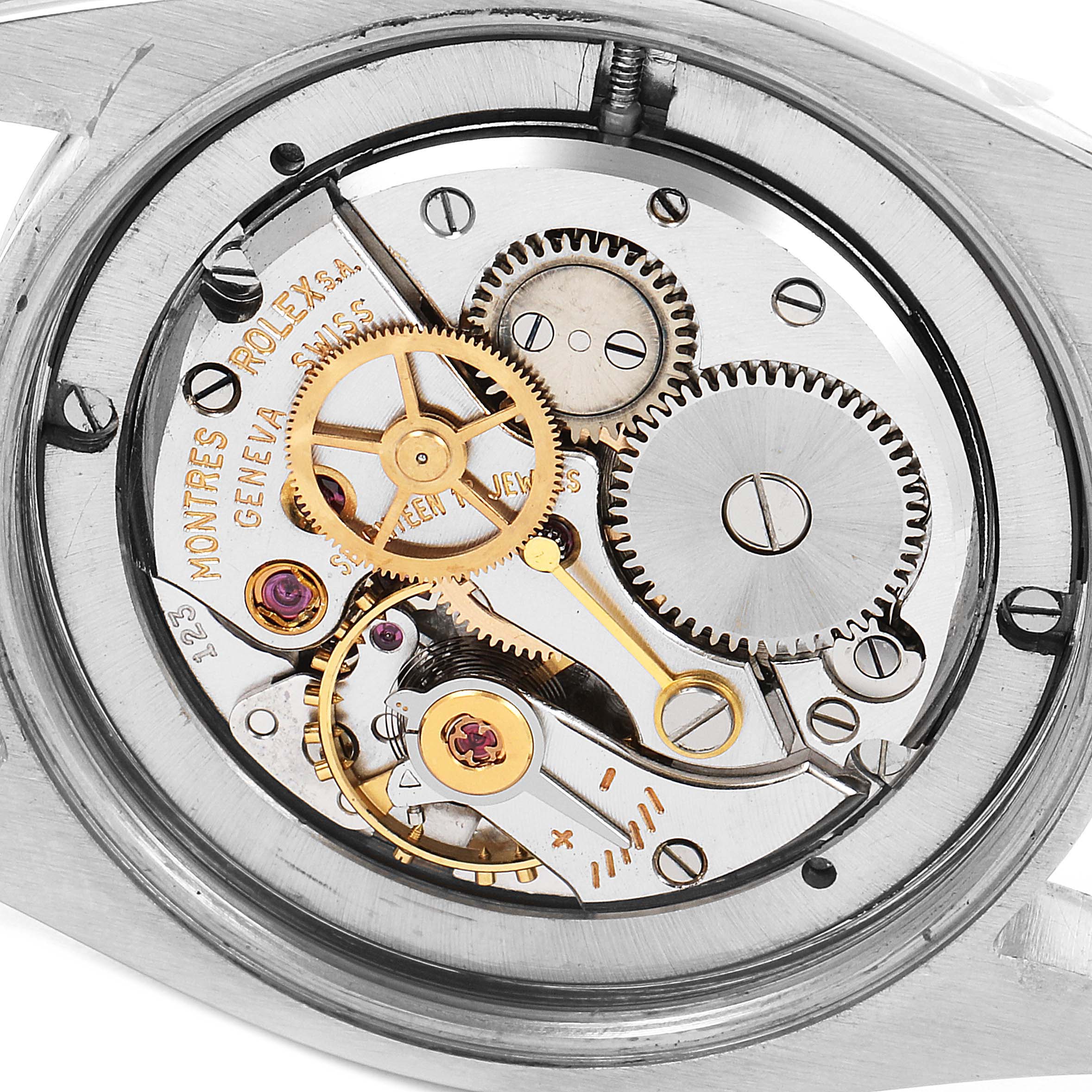 The image shows the internal mechanical workings and gears of a Rolex Vintage Collection 6694 Men's Stainless Steel Silver Dial 6694 Men's Stainless Steel Silver Dial watch from a close-up angle.