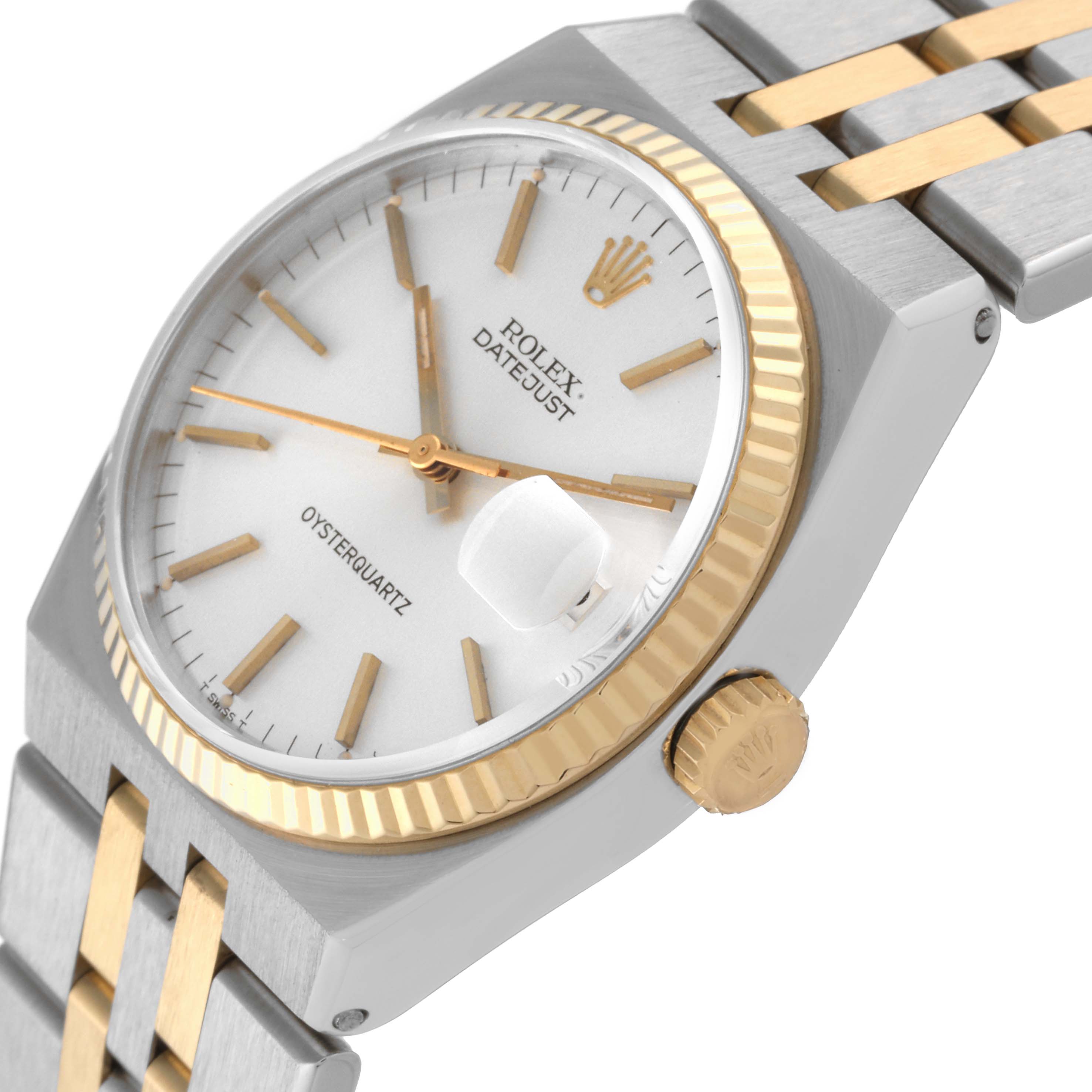 The image shows a Rolex Oysterquartz 17013 Men's Steel and Gold (two tone) Silver Dial 17013 Men's Steel and Gold (two tone) Silver Dial Datejust watch, angled slightly from the front, highlighting the dial, fluted bezel, and two-tone bracelet.