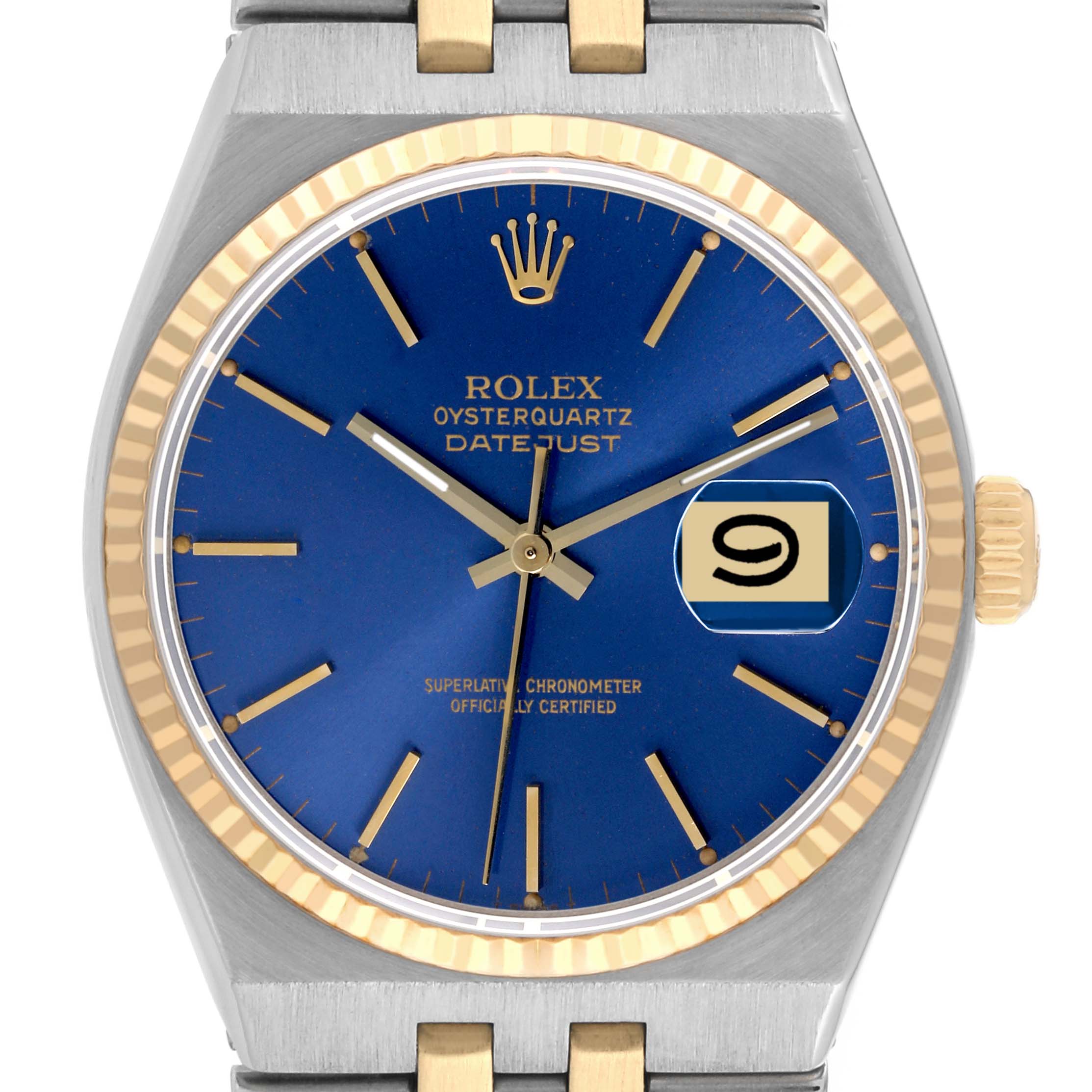 The Rolex Oysterquartz 17013 Men
s Steel and Gold (two tone) Blue Dial 17013 Men
s Steel and Gold (two tone) Blue Dial watch is shown from the front, displaying the blue dial, gold hands, date window, and part of the bracelet.