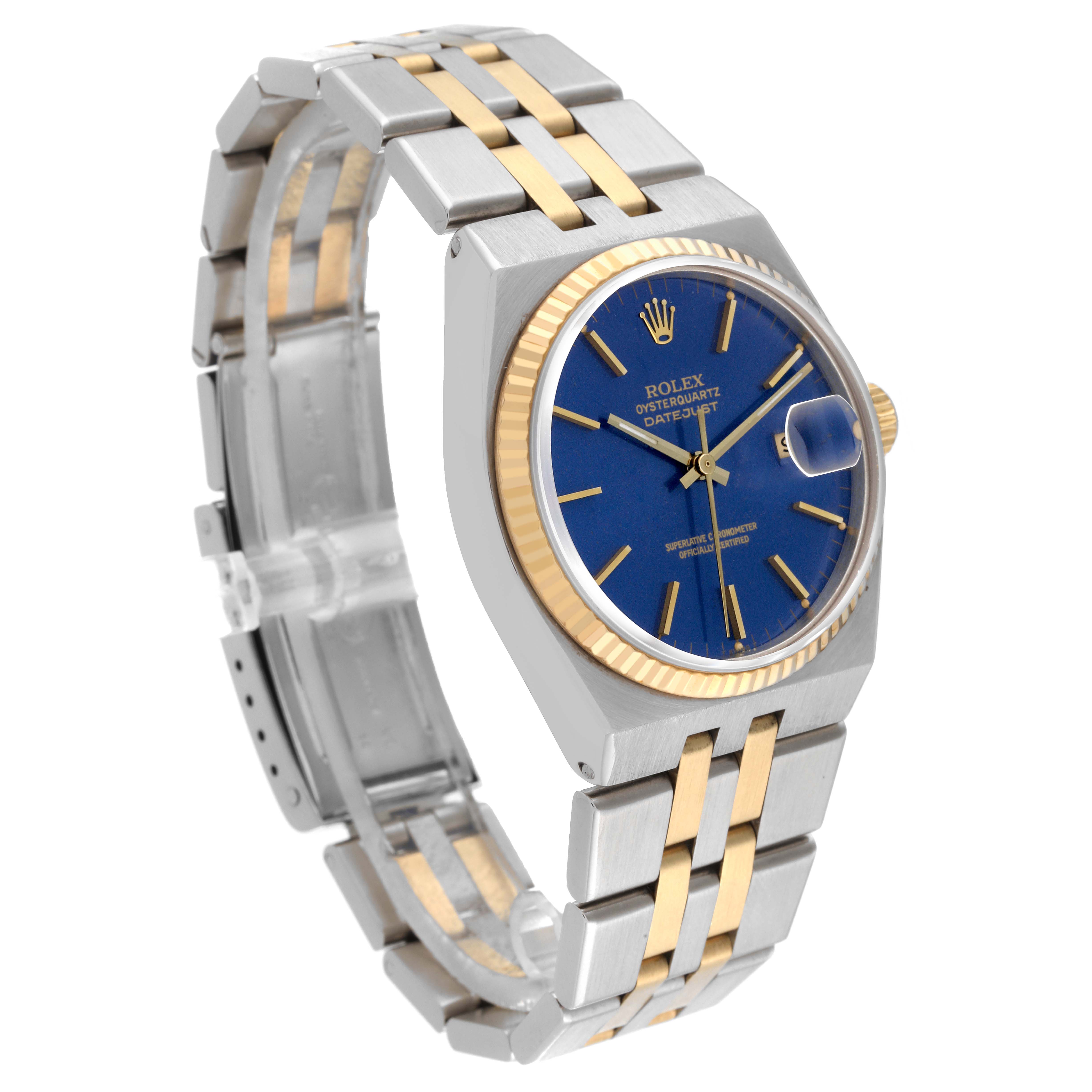 The Rolex Oysterquartz 17013 Men
s Steel and Gold (two tone) Blue Dial 17013 Men
s Steel and Gold (two tone) Blue Dial watch is shown at a slight angle, displaying the bracelet, bezel, dial, and crown.