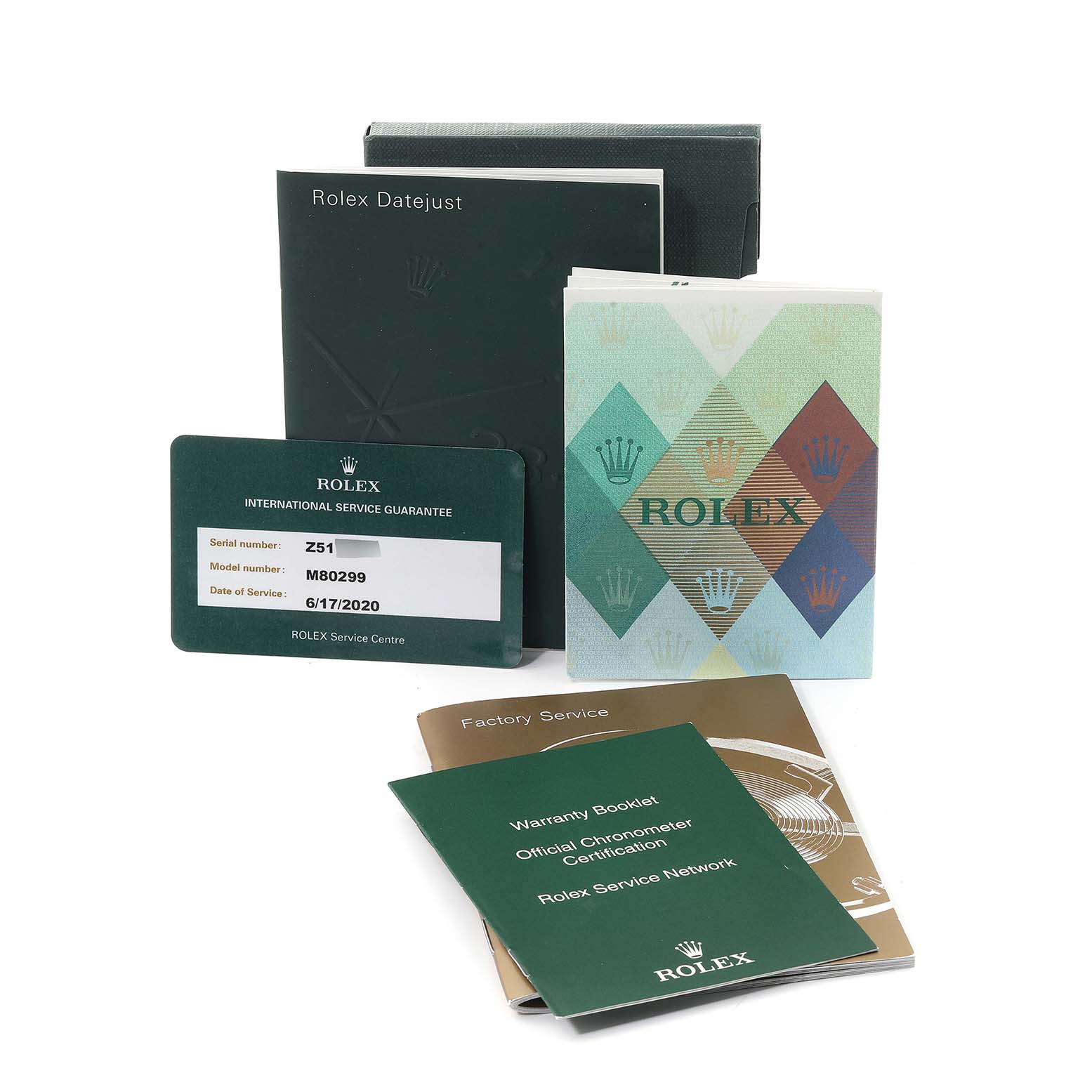 This image shows the warranty booklets, international service guarantee card, and pamphlets for the Rolex Pearlmaster 80299 Women's White Gold Mother of Pearl Dial 80299 Women's White Gold Mother of Pearl Dial watch model.