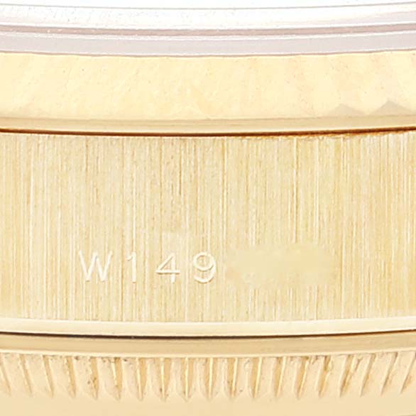 This close-up shows the side of the bezel and case of a Rolex President 69178 Women's Yellow Gold Black Dial 69178 Women's Yellow Gold Black Dial model watch, with part of the model number visible.