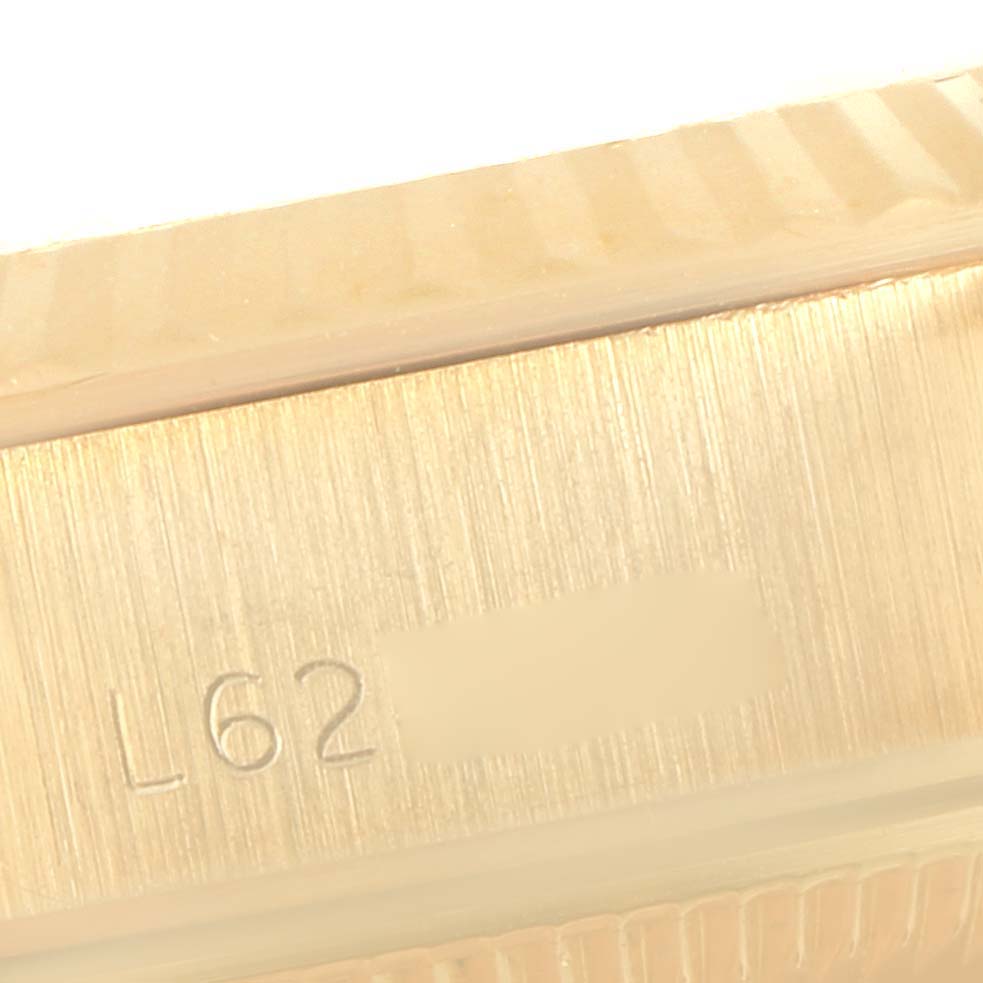 This image shows a close-up of the case side and fluted bezel of a Rolex President 69178 Women
s Yellow Gold Champagne Dial 69178 Women
s Yellow Gold Champagne Dial model watch.