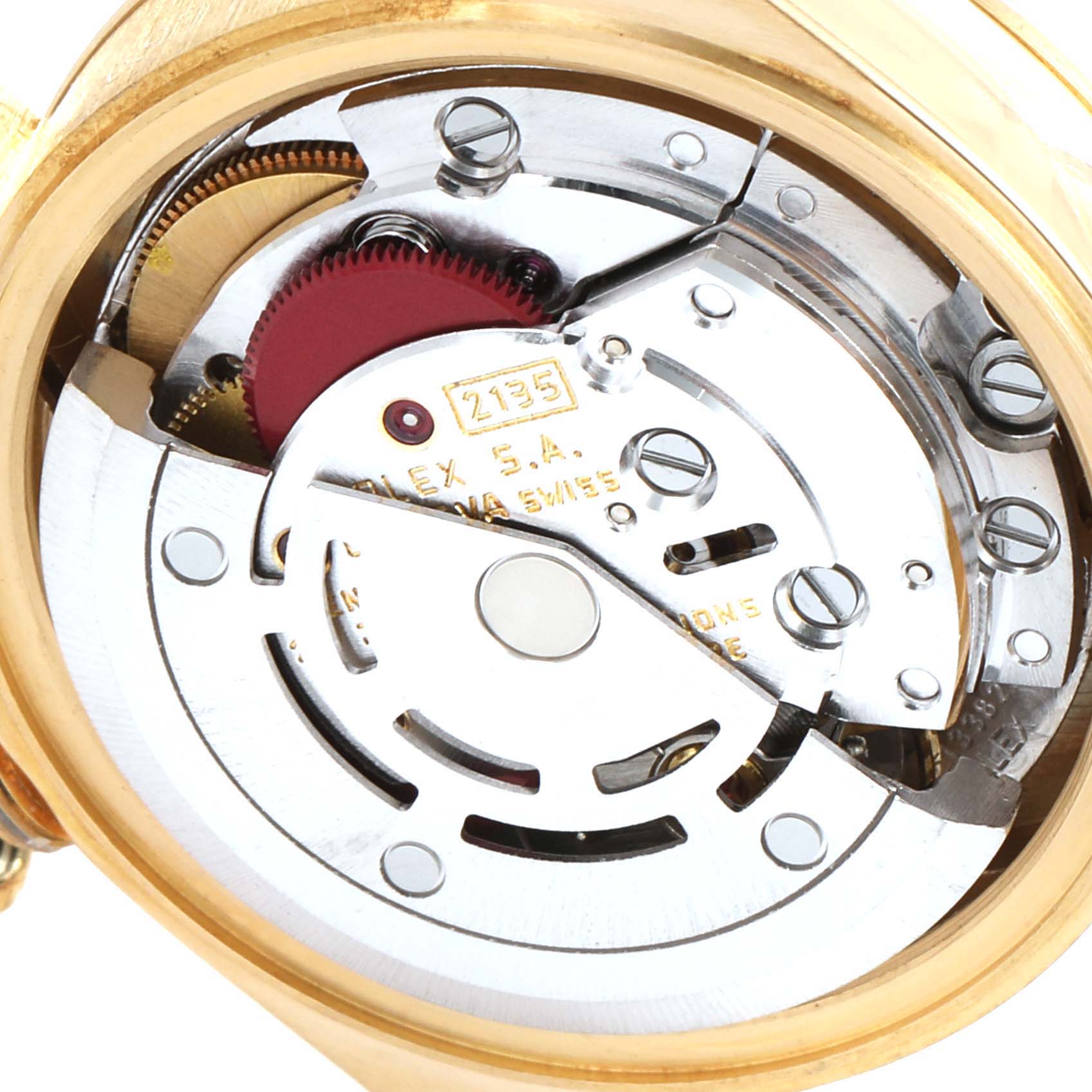 This image shows a close-up of the movement mechanism of a Rolex President 69178 Women
s Yellow Gold Champagne Dial 69178 Women
s Yellow Gold Champagne Dial watch, highlighting the intricate internal parts.