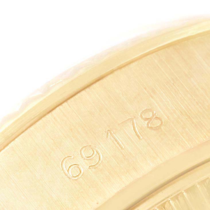 The image shows a close-up of the engraved model number "69178" on the side of the Rolex President 69178 Women
s Yellow Gold Champagne Dial 69178 Women
s Yellow Gold Champagne Dial watch.