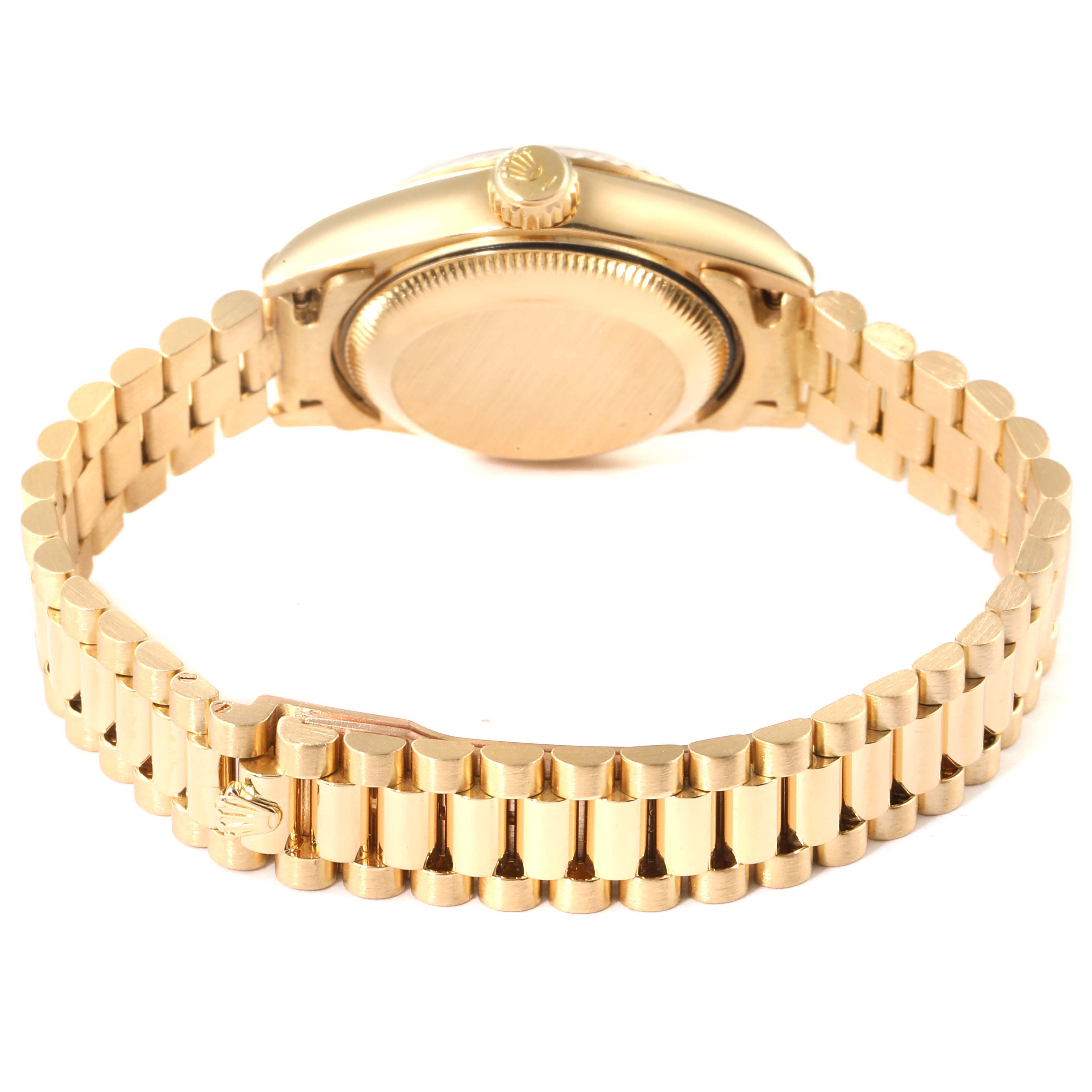 The image shows the back view of a Rolex President 69178 Women
s Yellow Gold Champagne Dial 69178 Women
s Yellow Gold Champagne Dial model watch, highlighting the case back and bracelet.