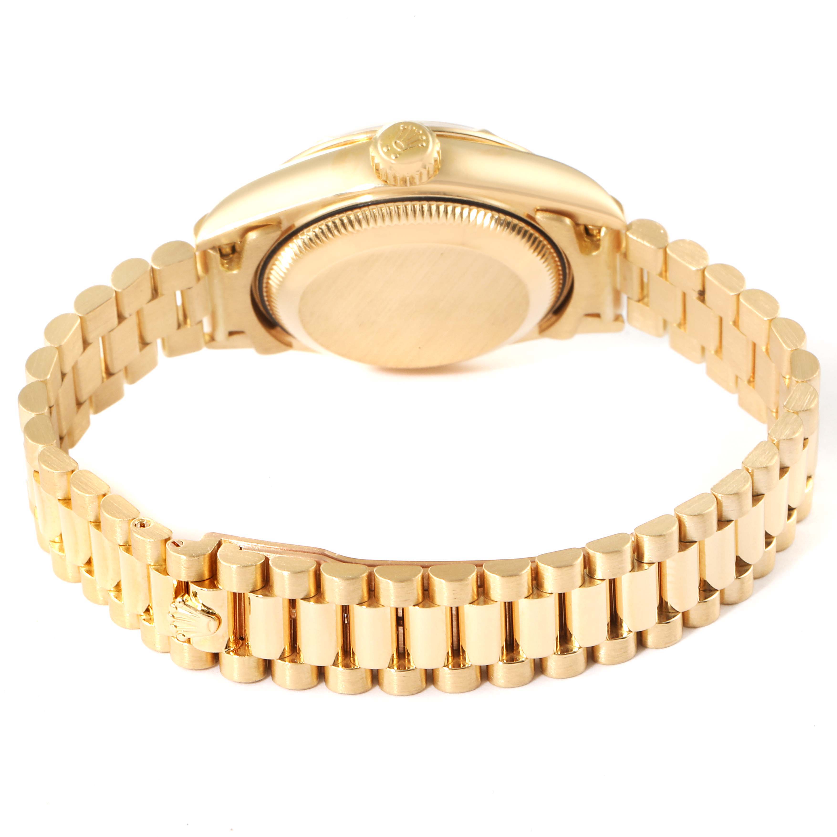 This image shows the back view of a Rolex President 79258 Women
s Yellow Gold White Dial 79258 Women
s Yellow Gold White Dial model watch, displaying its case back and metal bracelet.