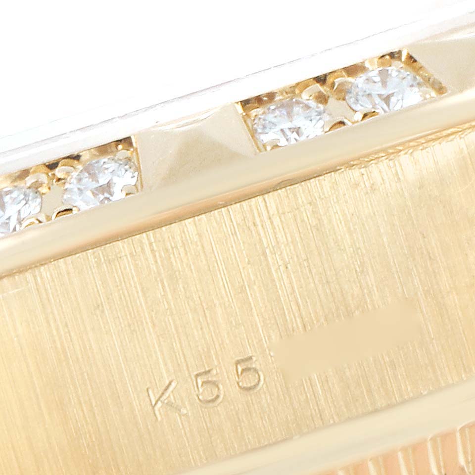 This image shows a close-up of the gold case and diamond accents of a Rolex President 79258 Women
s Yellow Gold White Dial 79258 Women
s Yellow Gold White Dial model watch.