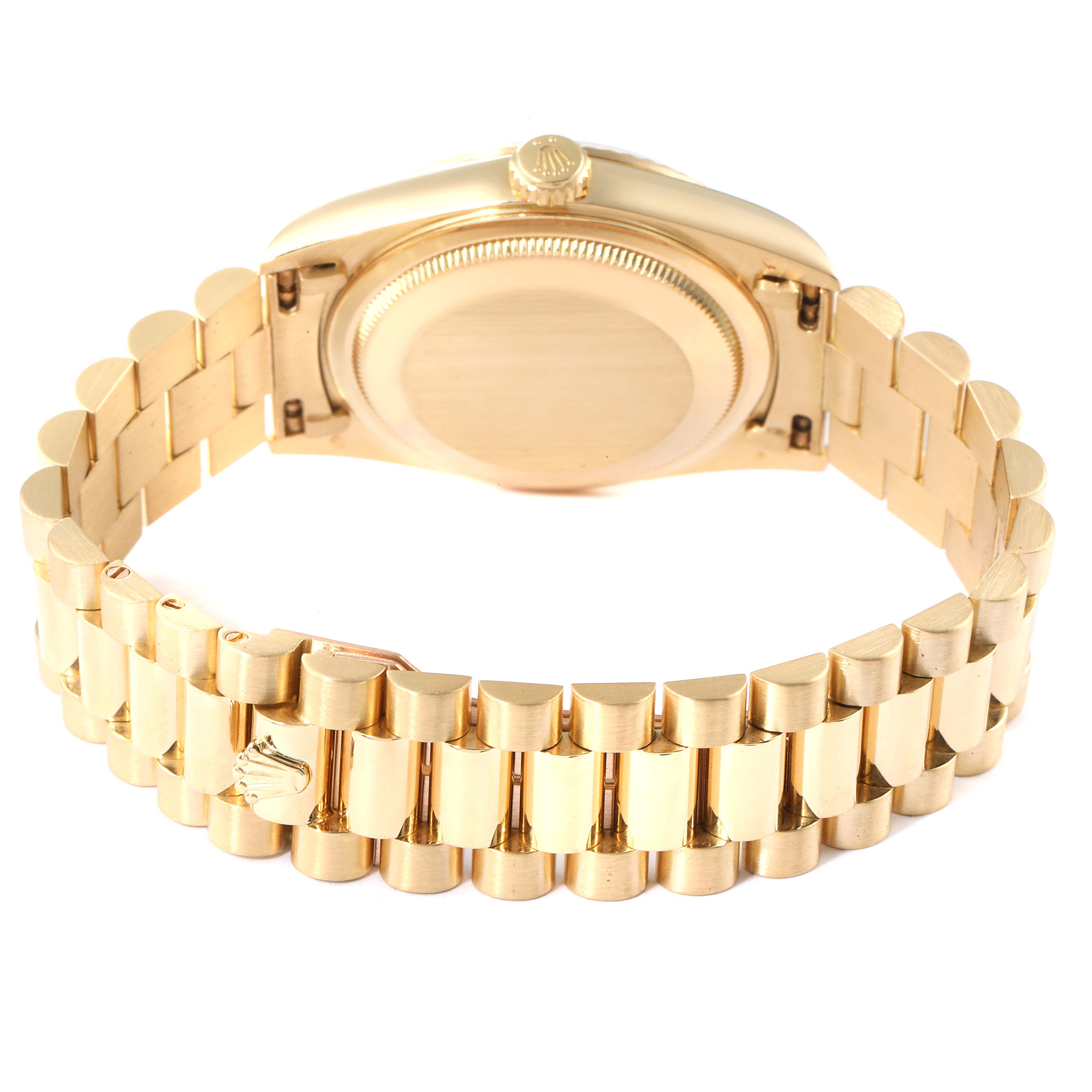 This is a rear view of the Rolex President 18238 Men's Yellow Gold Champagne Dial 18238 Men's Yellow Gold Champagne Dial model watch showing the bracelet and the case back.