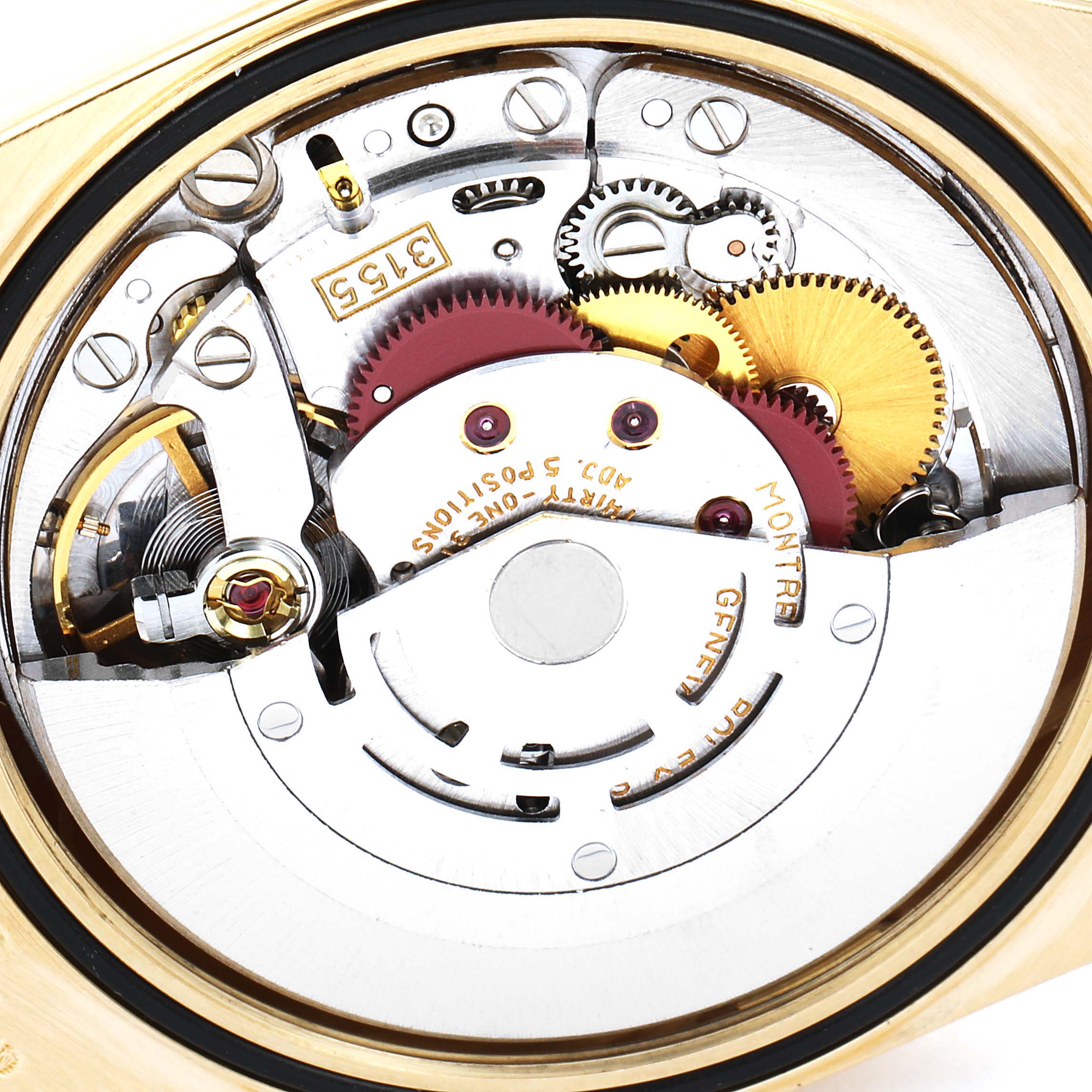 This image depicts a close-up view of the intricate inner mechanics of a Rolex President 18238 Men's Yellow Gold Champagne Dial 18238 Men's Yellow Gold Champagne Dial model watch.