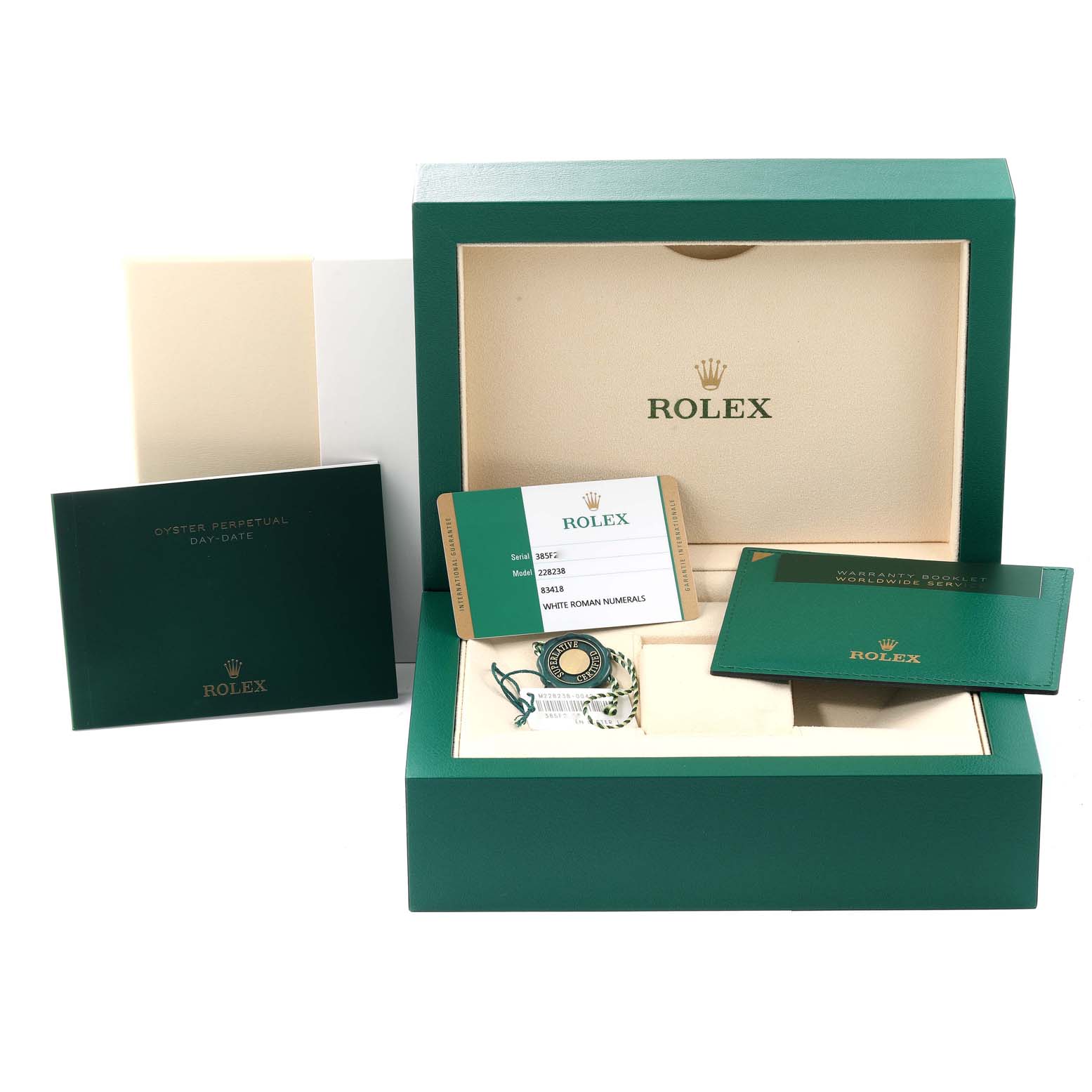 The image shows a Rolex President 228238 Men
s Yellow Gold White Dial 228238 Men
s Yellow Gold White Dial model box set with warranty cards, tags, and booklets from a frontal angle.