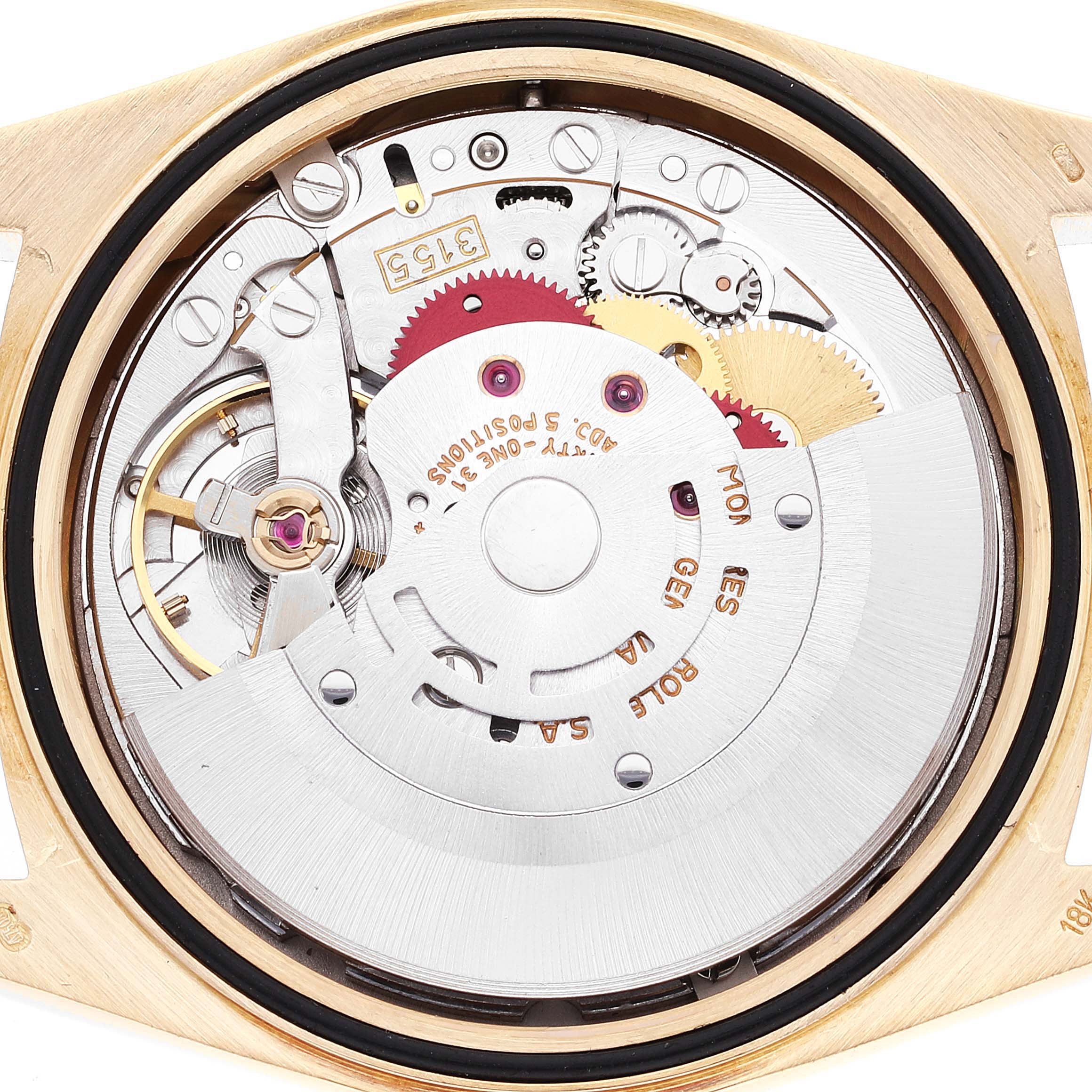 This image shows the internal mechanism of a Rolex President 18238 Men's Yellow Gold Champagne Dial 18238 Men's Yellow Gold Champagne Dial model watch, including gears and the balance wheel.
