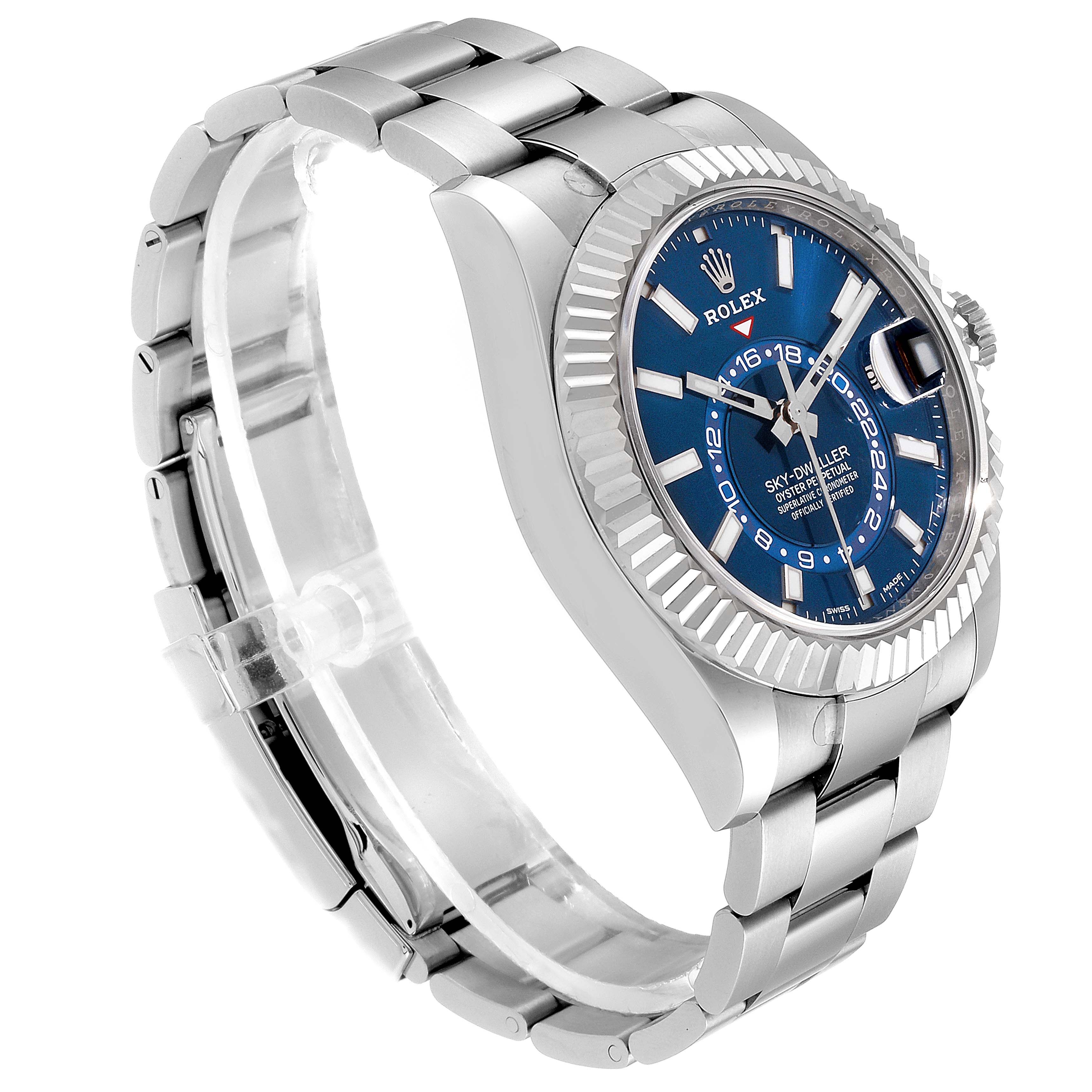The image shows a Rolex Sky-Dweller 326934 Men's Stainless Steel Blue Dial 326934 Men's Stainless Steel Blue Dial watch at an oblique angle, highlighting its blue dial, fluted bezel, and stainless steel bracelet.