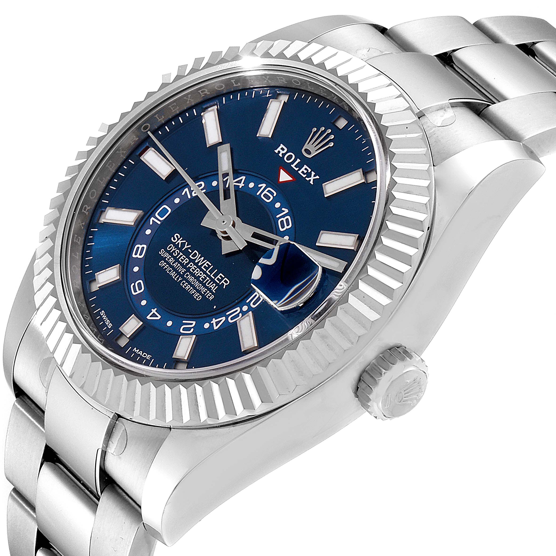 The image shows a side-angle view of a Rolex Sky-Dweller 326934 Men's Stainless Steel Blue Dial 326934 Men's Stainless Steel Blue Dial watch, displaying its blue dial, fluted bezel, and part of the metal bracelet.