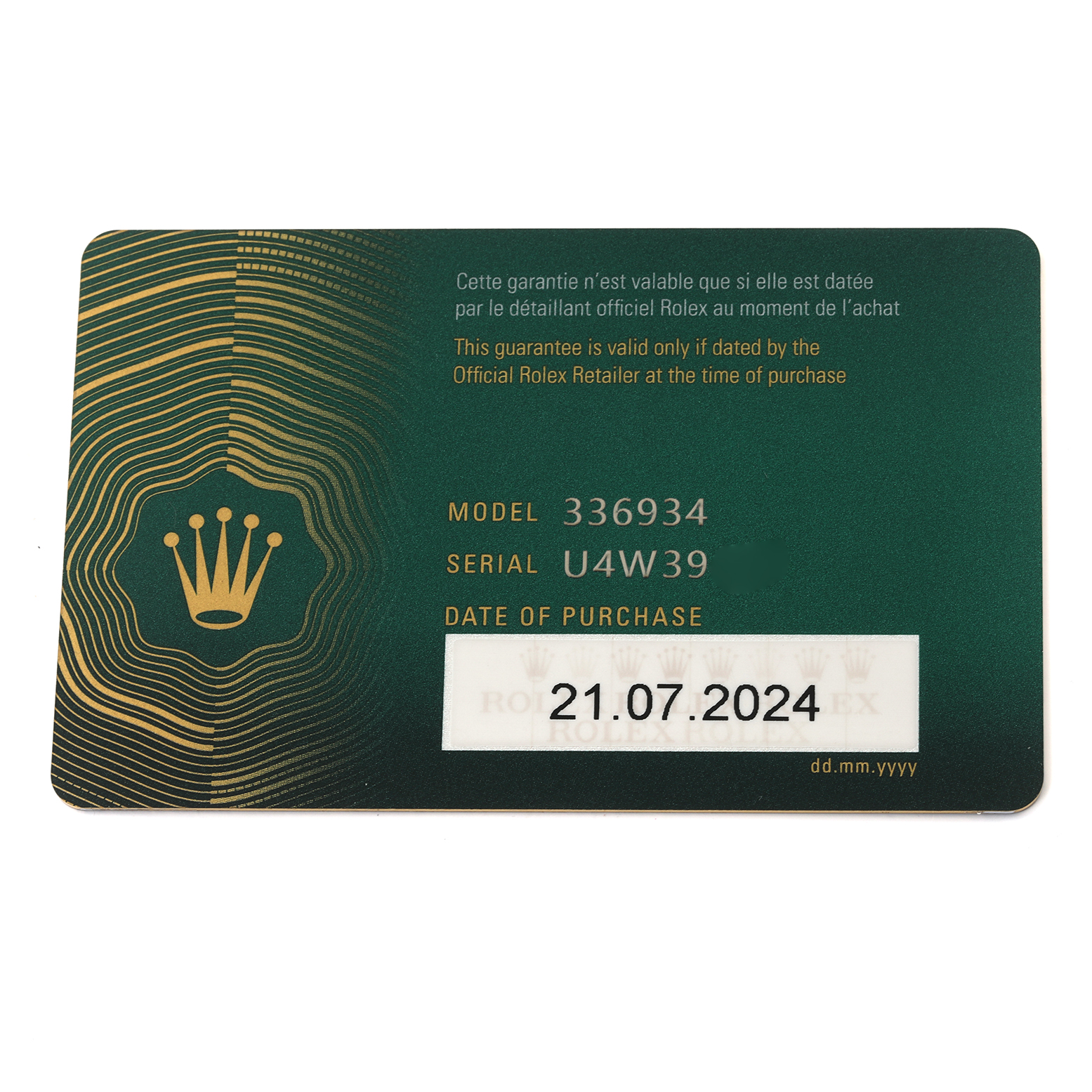 This image shows the warranty card for a Rolex Sky-Dweller 336934 Men
s Stainless Steel Green Dial 336934 Men
s Stainless Steel Green Dial watch, including model number 336934 and serial number U4W39.