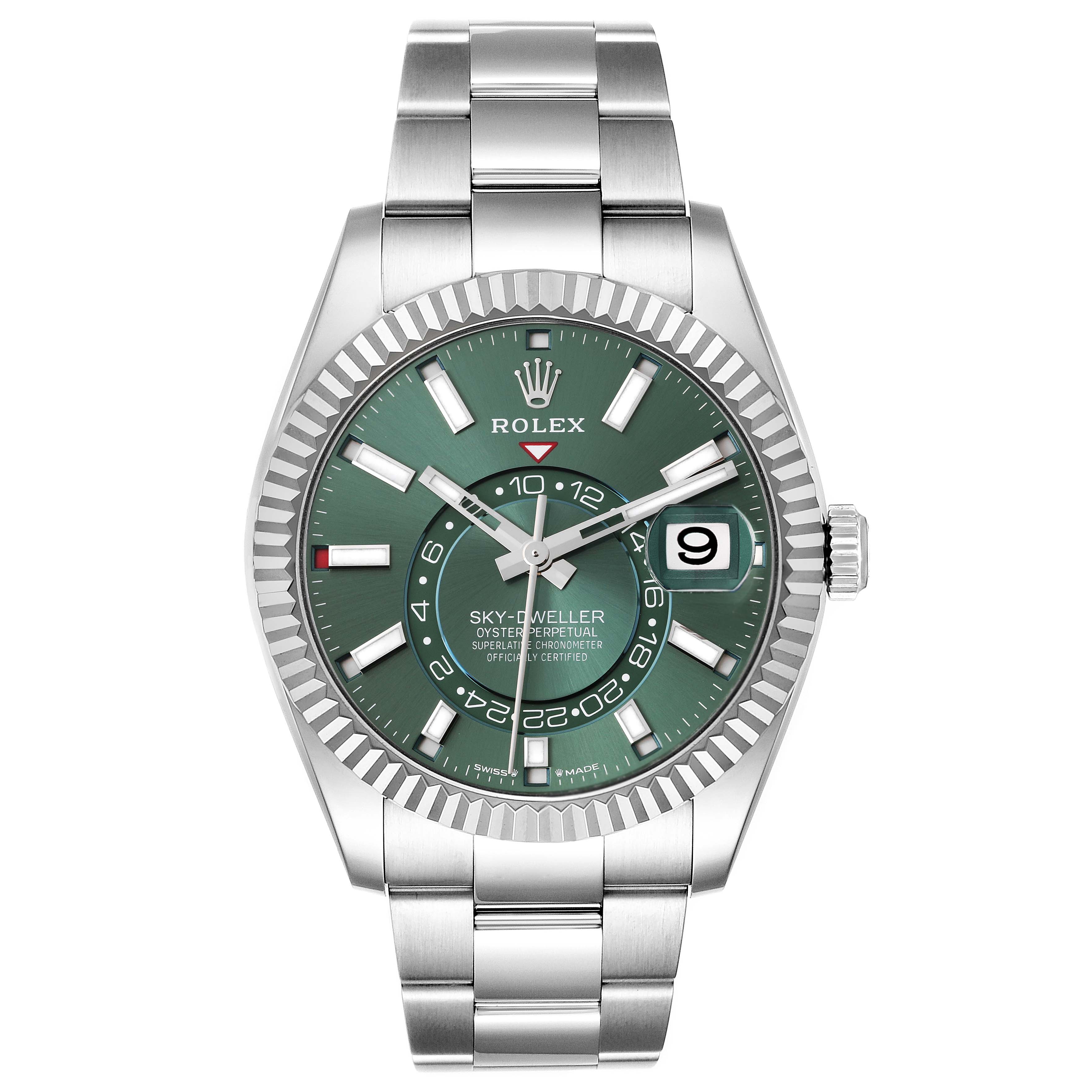 The image shows a Rolex Sky-Dweller 336934 Men
s Stainless Steel Green Dial 336934 Men
s Stainless Steel Green Dial watch with a green dial, silver bezel, and metal bracelet from a front-angle view.