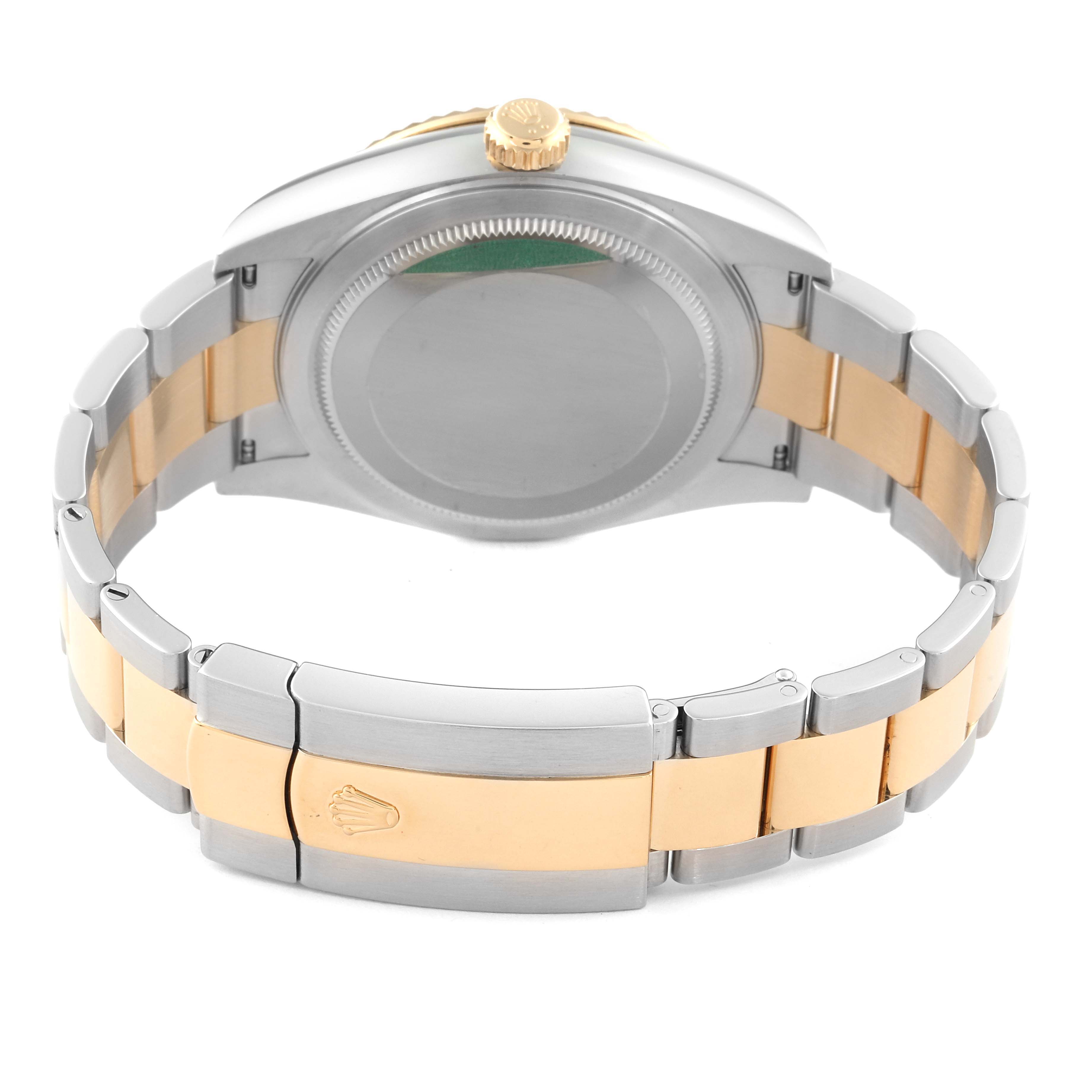 This image shows the back view of a Rolex Sky-Dweller 326933 Men's Steel and Gold (two tone) Champagne Dial 326933 Men's Steel and Gold (two tone) Champagne Dial watch, highlighting the case back, crown, and two-tone bracelet with a clasp.