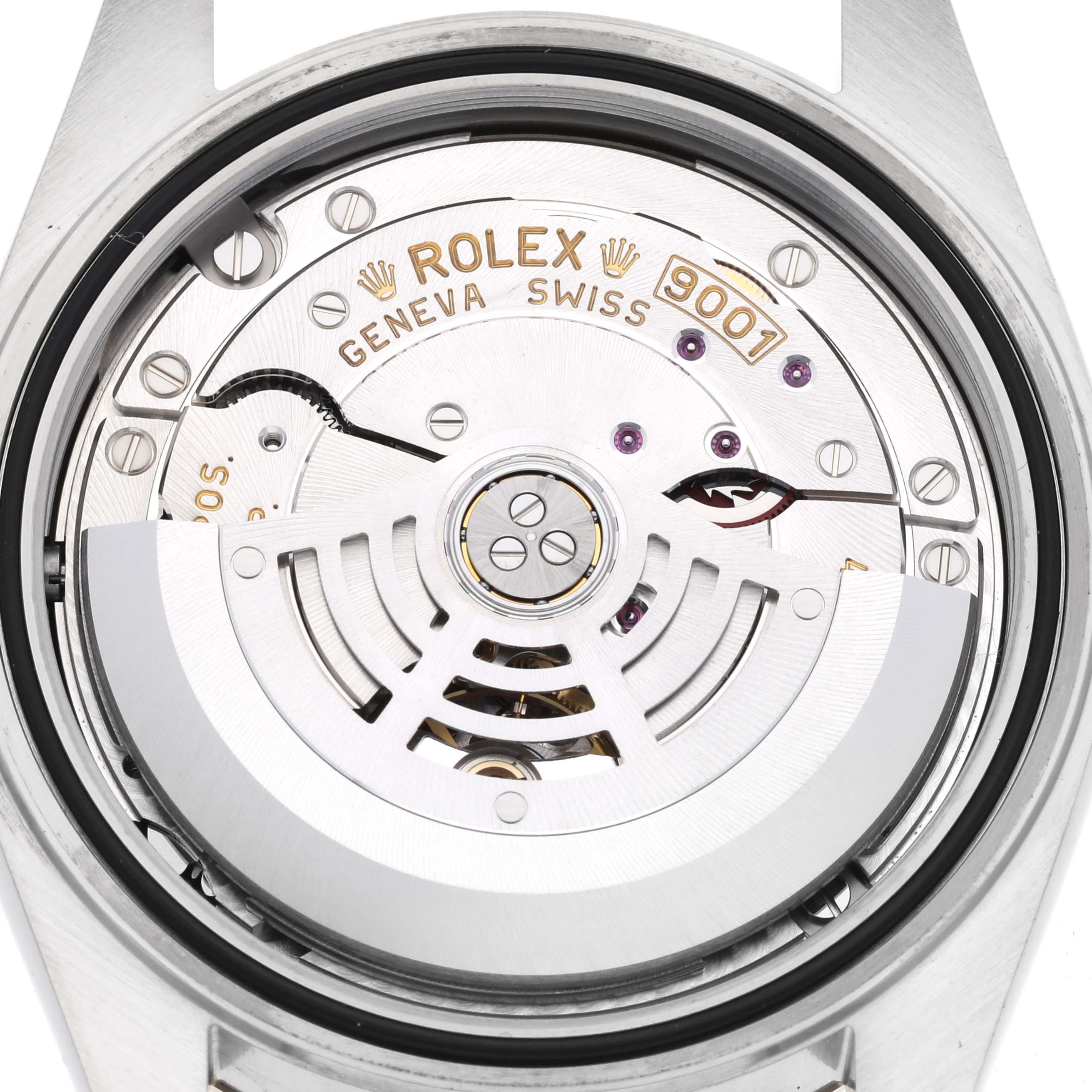 This image shows a close-up view of the movement mechanism of a Rolex Sky-Dweller 326933 Men's Steel and Gold (two tone) Champagne Dial 326933 Men's Steel and Gold (two tone) Champagne Dial watch, highlighting its intricate internal parts.