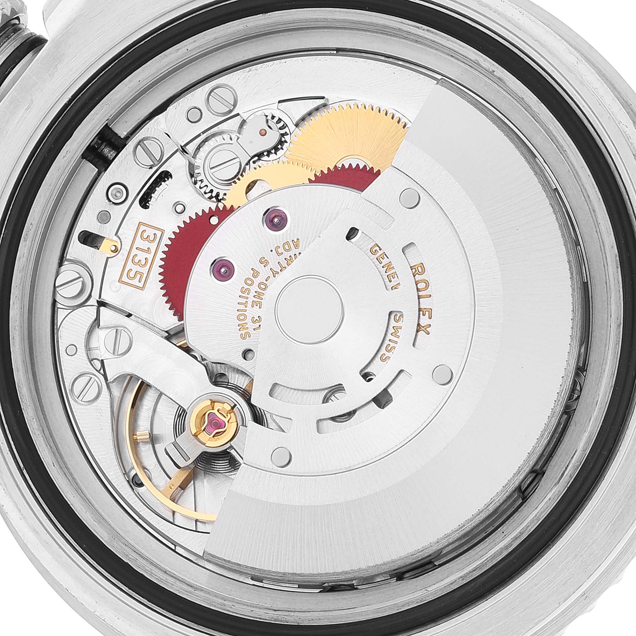 This close-up image shows the intricate mechanical components and movement of a Rolex Submariner 116610 Men
s Stainless Steel Black Dial 116610 Men
s Stainless Steel Black Dial watch.