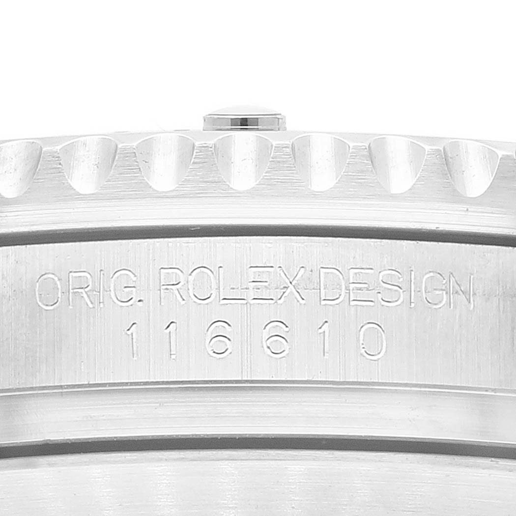 This image shows a close-up of the engraved side of the bezel and case of a Rolex Submariner 116610 Men
s Stainless Steel Black Dial 116610 Men
s Stainless Steel Black Dial model 116610.
