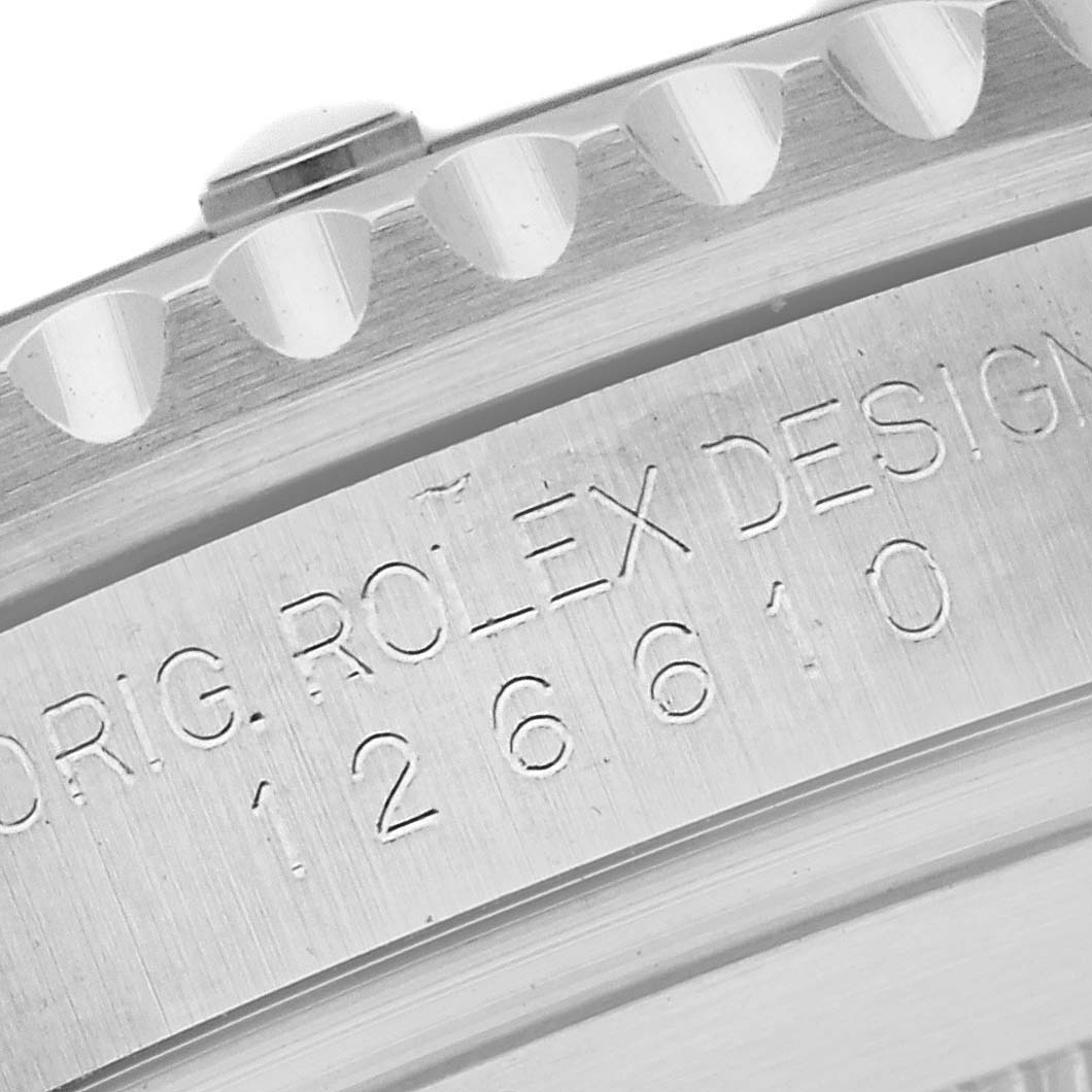 The image shows a close-up of the engraved side of a Rolex Submariner 126610LV Men's Stainless Steel Black Dial 126610LV Men's Stainless Steel Black Dial watch, focusing on the model number and bezel.