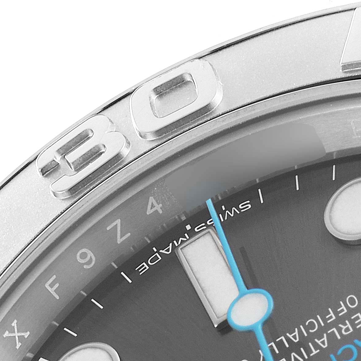 This close-up image of the Rolex Yacht-Master 116622 Men
s Stainless Steel Grey Dial 116622 Men
s Stainless Steel Grey Dial watch shows the bezel with the number 
30
 and part of the dark dial with blue accents.